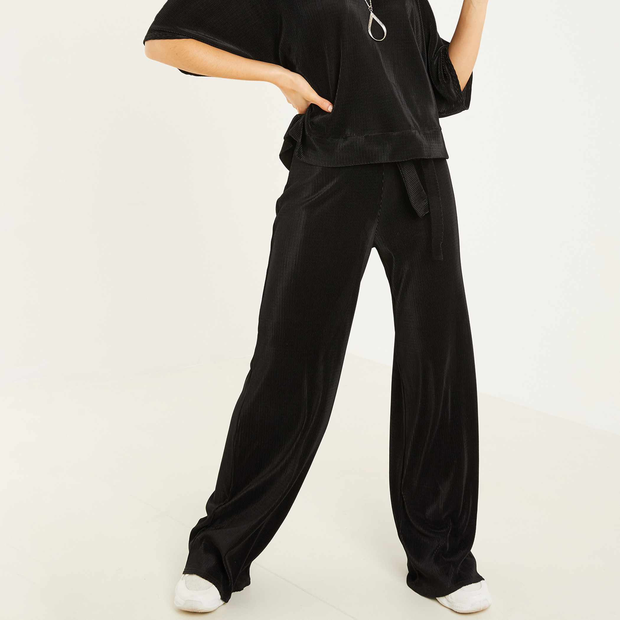 Buy Women s Quiz Women Black Solid Palazzo Trousers Online Centrepoint Qatar