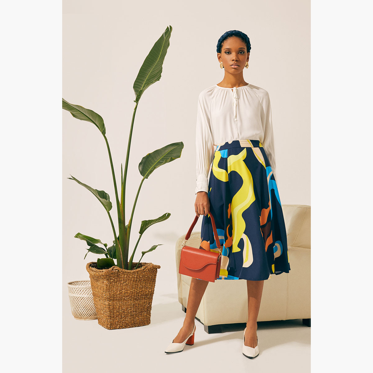تنورة إيه لاين بطبعات وتفاصيل فتحة من رينا-women-clothing-bottoms-skirts-image-2