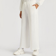 Solid Mid-Rise Track Pants with Pockets and Drawstring Closure