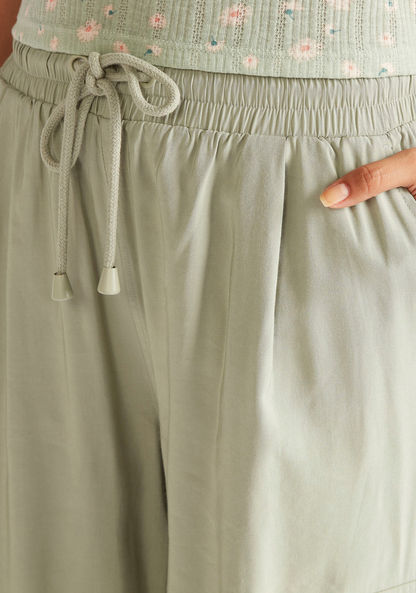 Solid High-Rise Wide Leg Pants with Pockets and Drawstring Closure