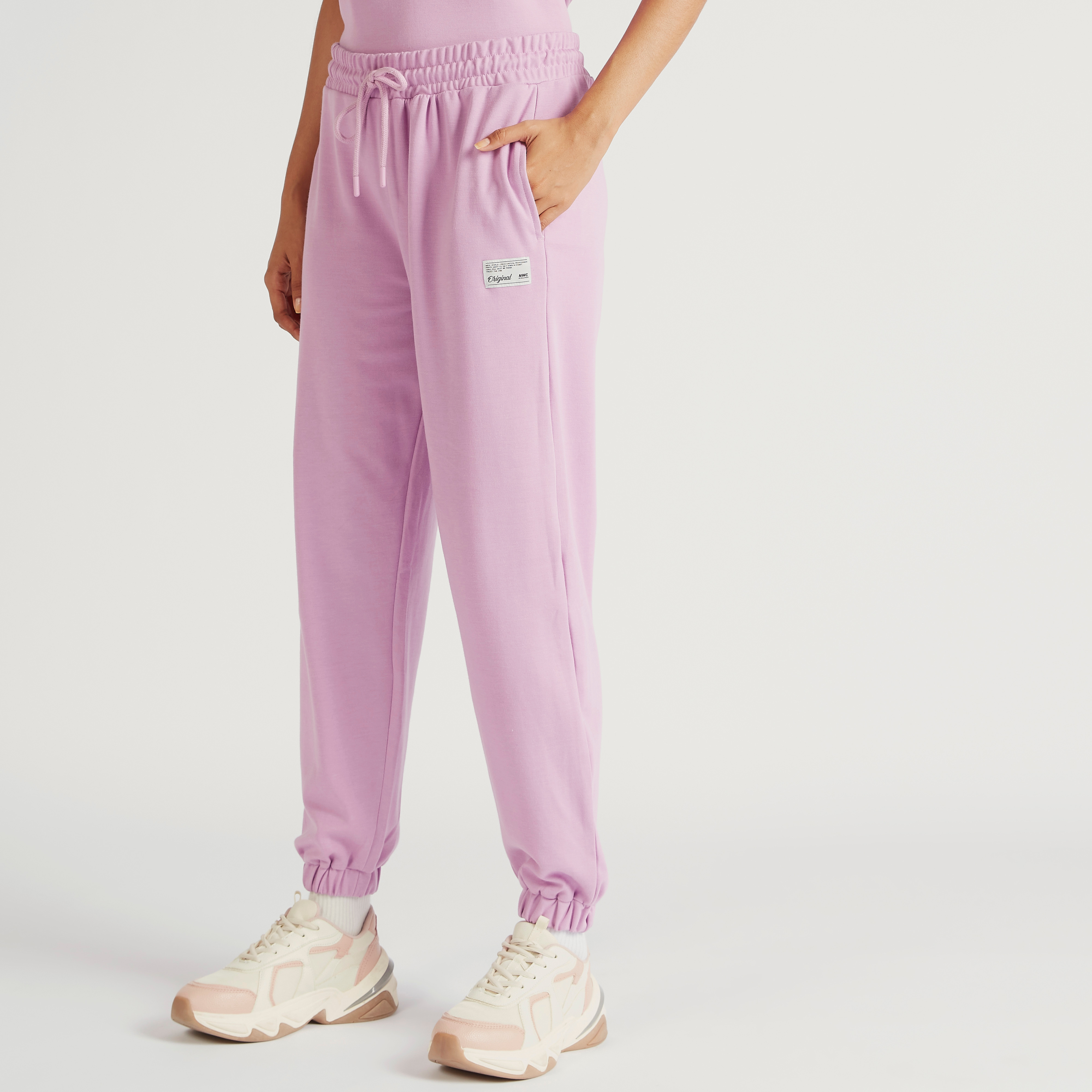 Buy Women s Solid Mid Rise Joggers with Drawstring Closure and Pockets Online Centrepoint UAE