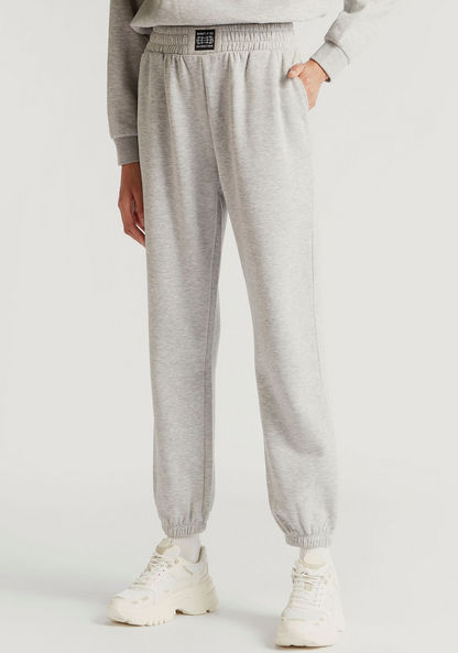 Solid High-Rise Joggers with Elasticated Waist and Pockets