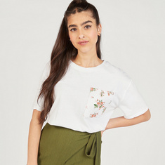 Solid Round Neck T-shirt with Floral Print Patch Pocket