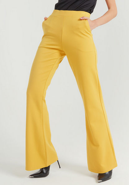 Solid Mid-Rise Trousers with Pockets and Flared Hem-Pants-image-0