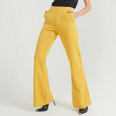 Solid Mid-Rise Trousers with Pockets and Flared Hem