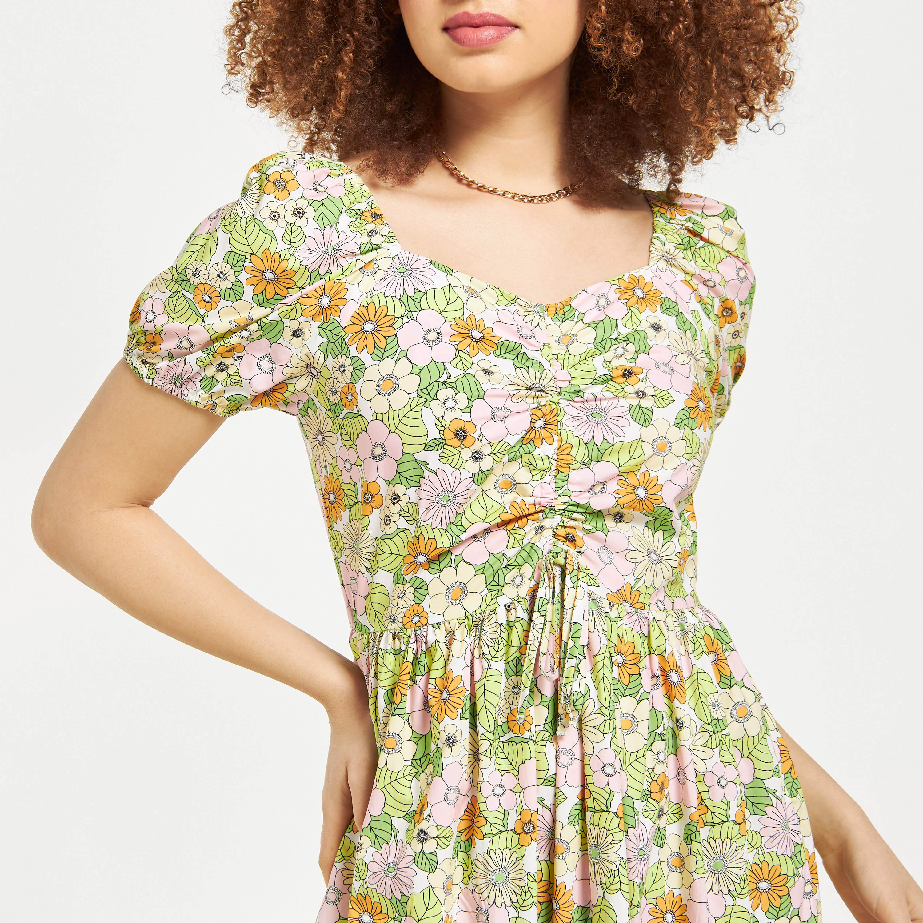 And yellow floral shop tie up dress