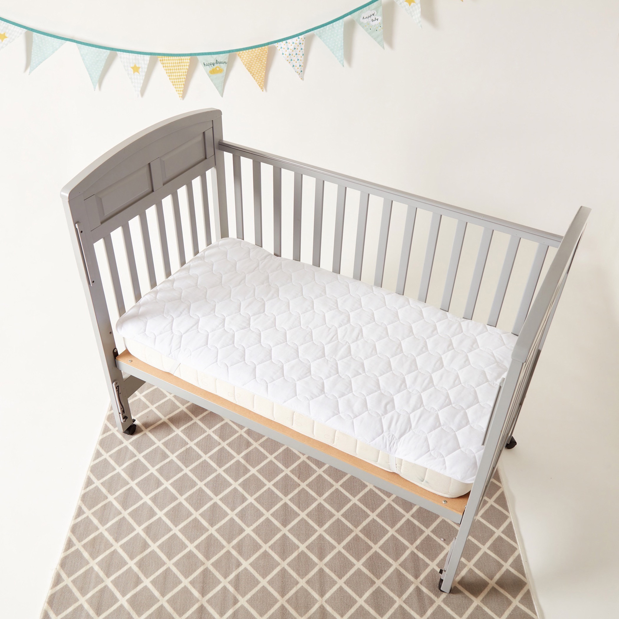 Buy buy baby crib mattress pad hotsell