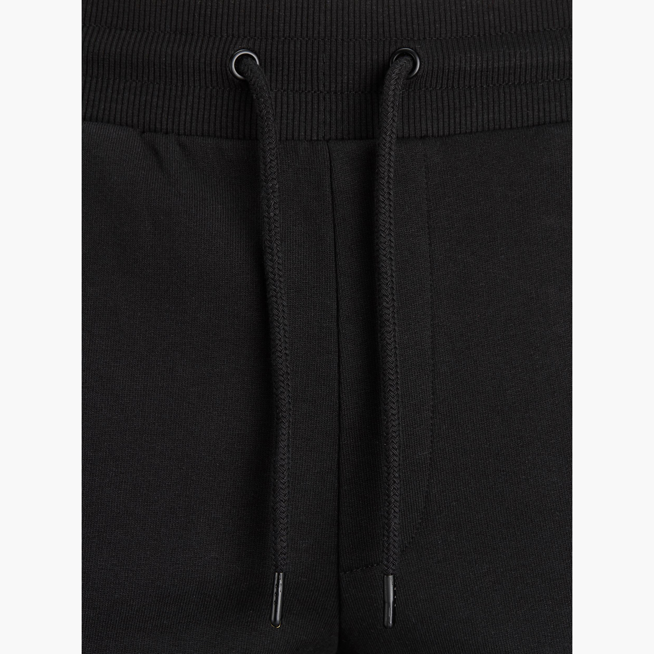بنطلون رياضي سادة بجيوب ورباط إغلاق من جاك & جونز-men-clothing-bottoms-joggers-image-5