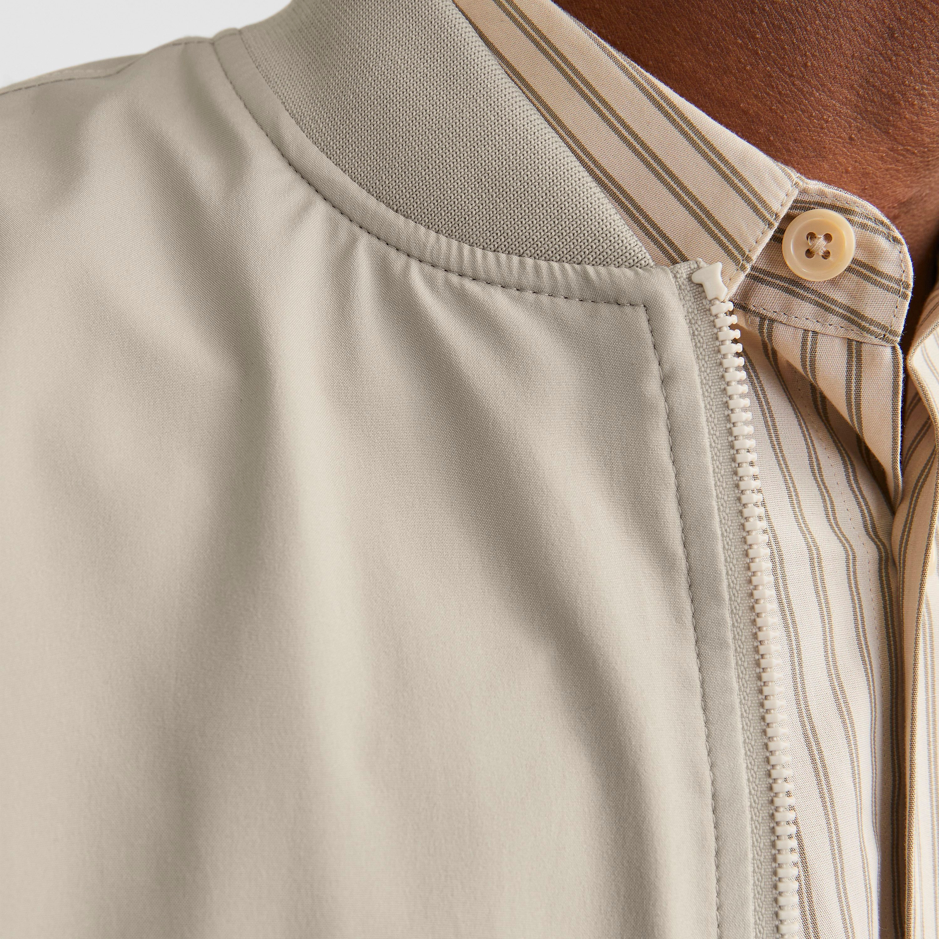 جاكيت بومبر رجالي سادة بياقة قائمة وأكمام طويلة من جاك ان جونز-men-clothing-jacketsandblazers-jackets-image-3