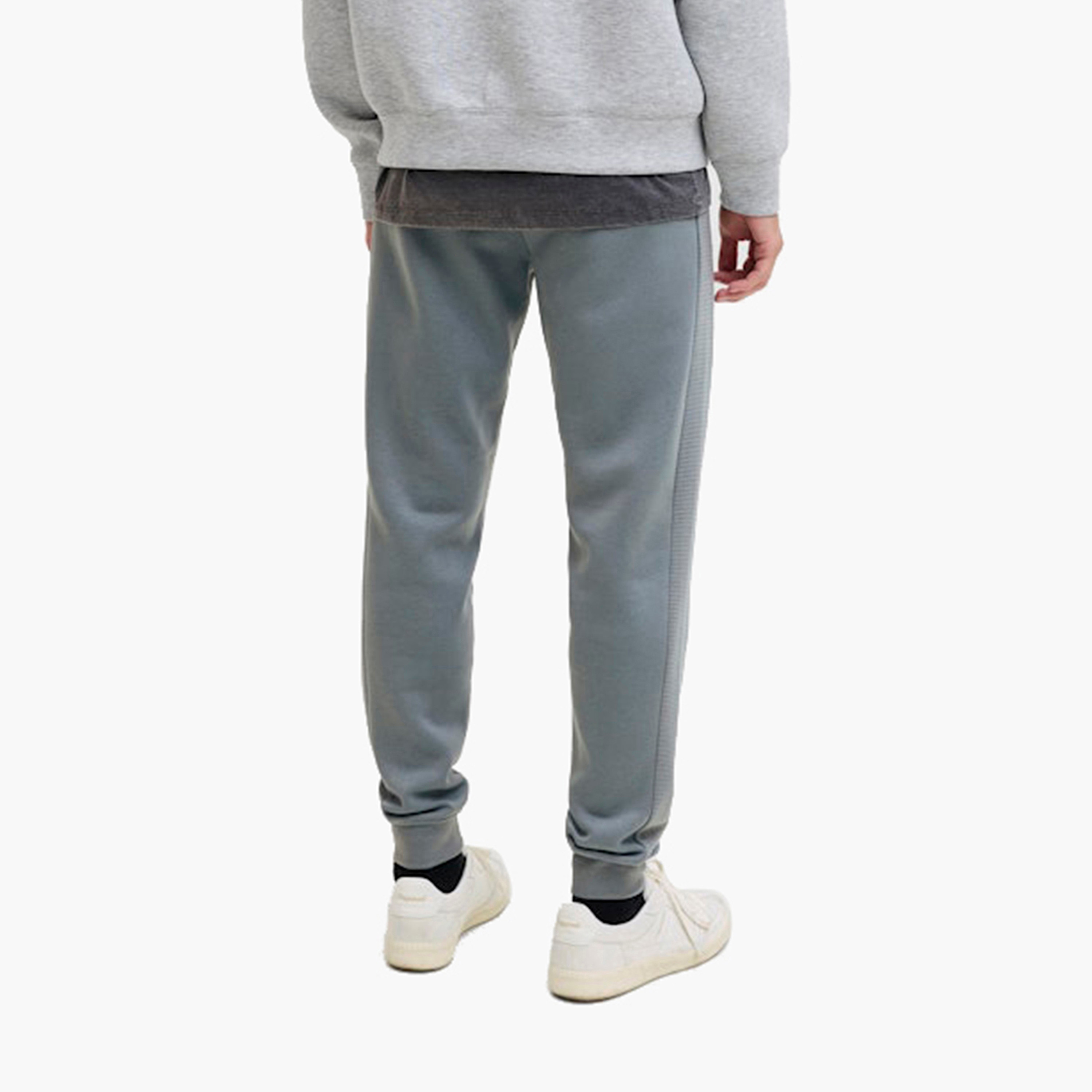 بنطلون رياضي (جوغر) رجالي جاك آند جونز سادة برباط شد وخصر متوسط الارتفاع-men-clothing-bottoms-joggers-image-14