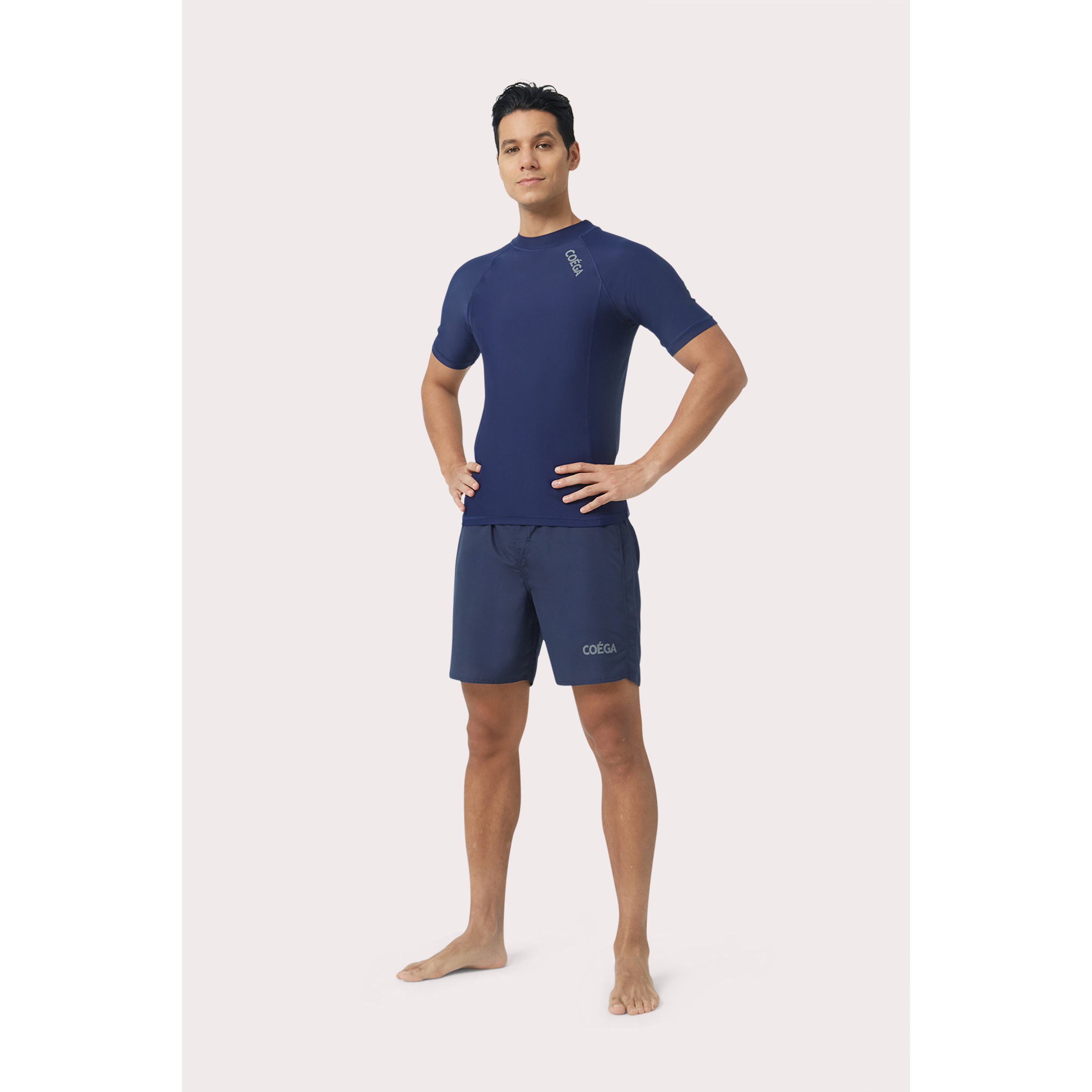 كويغا رجال بأكمام قصيرة - سوليد بحرية-sports-men-clothing-swimwear-image-2