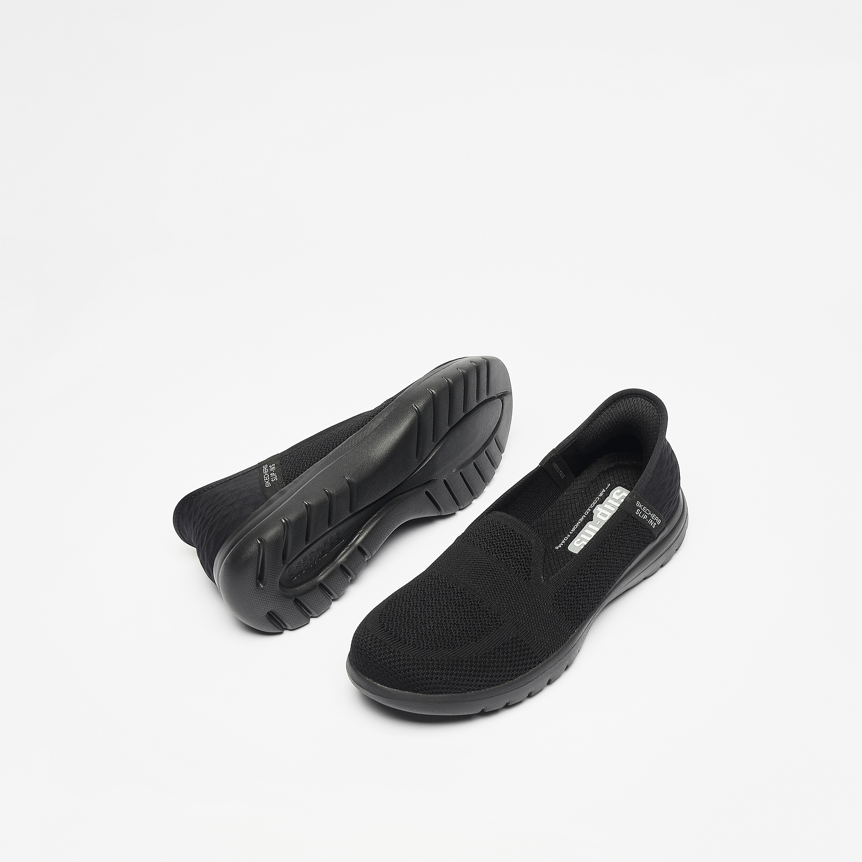 Skechers black you serene slip trainers online