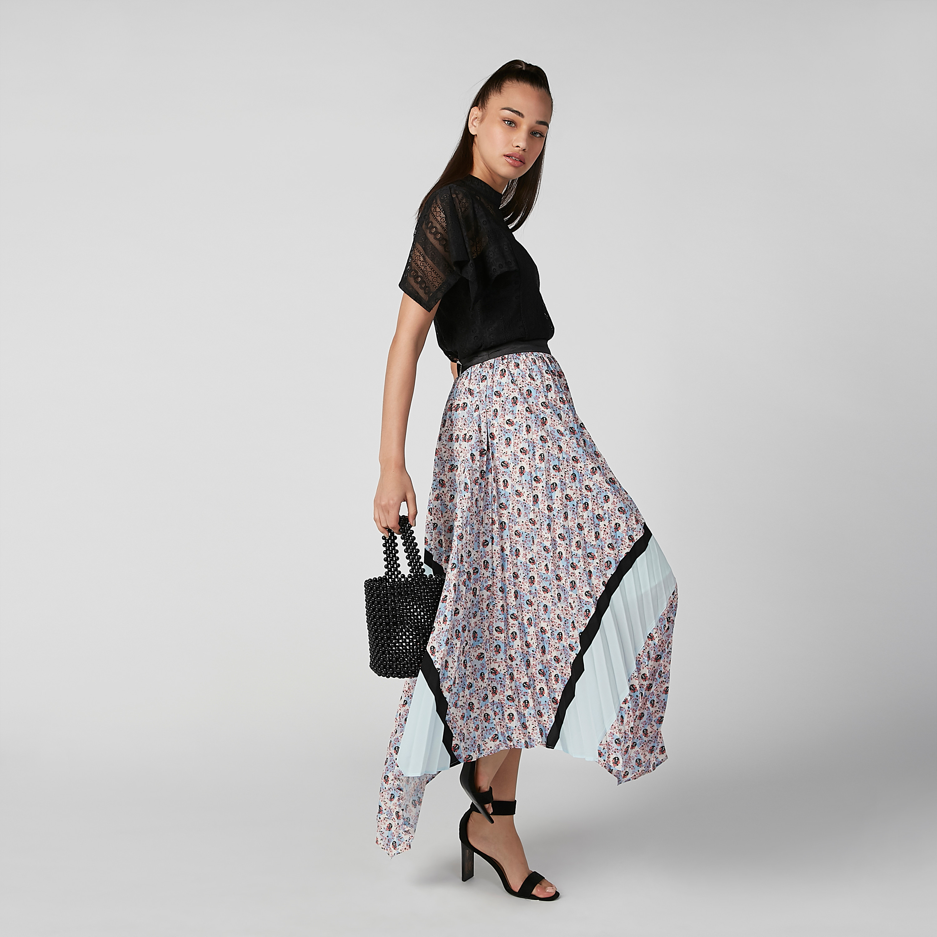 Buy Women s ELLE Printed Skirt with Asymmetric Hem and Elasticised Waistband Online Centrepoint UAE