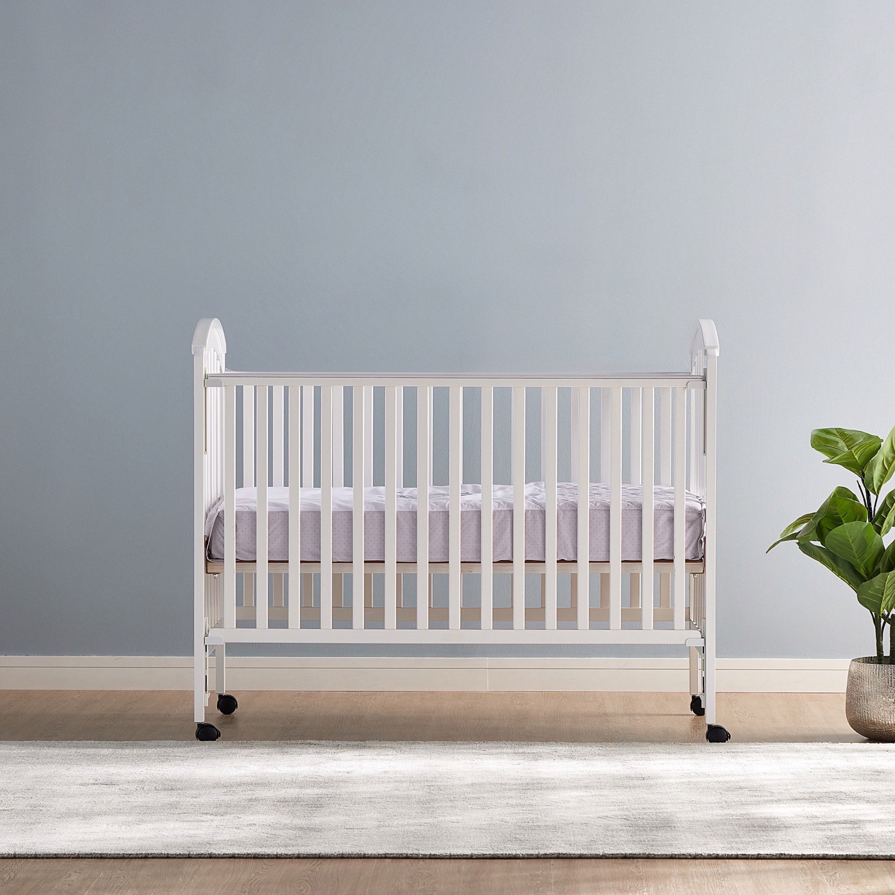 Grey wood best sale baby crib