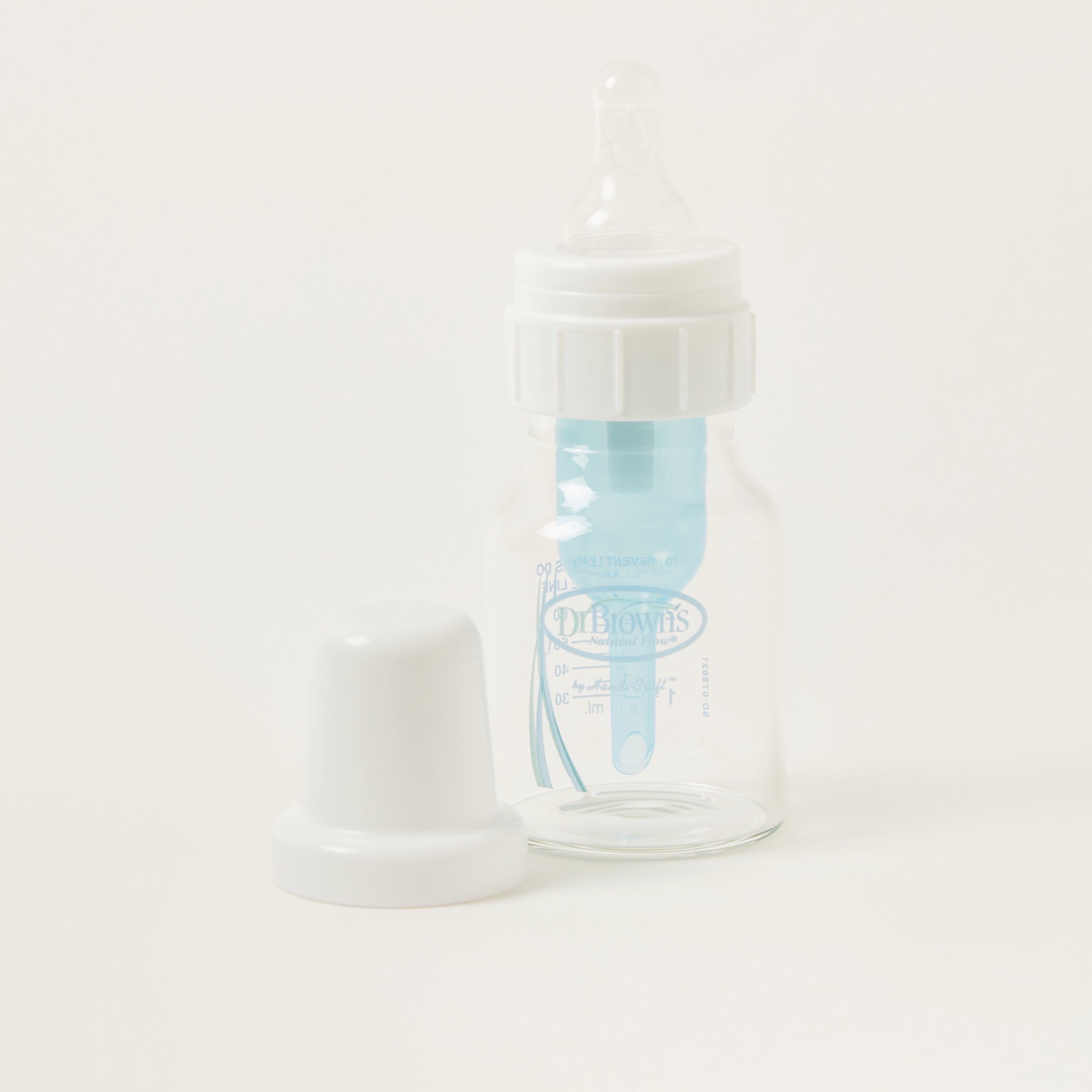 طقم رضّاعة بتدفق طبيعي وفرشاة من دكتور براون - 60 مل-baby-feeding-feedingbottles-bottlesandteats-image-1