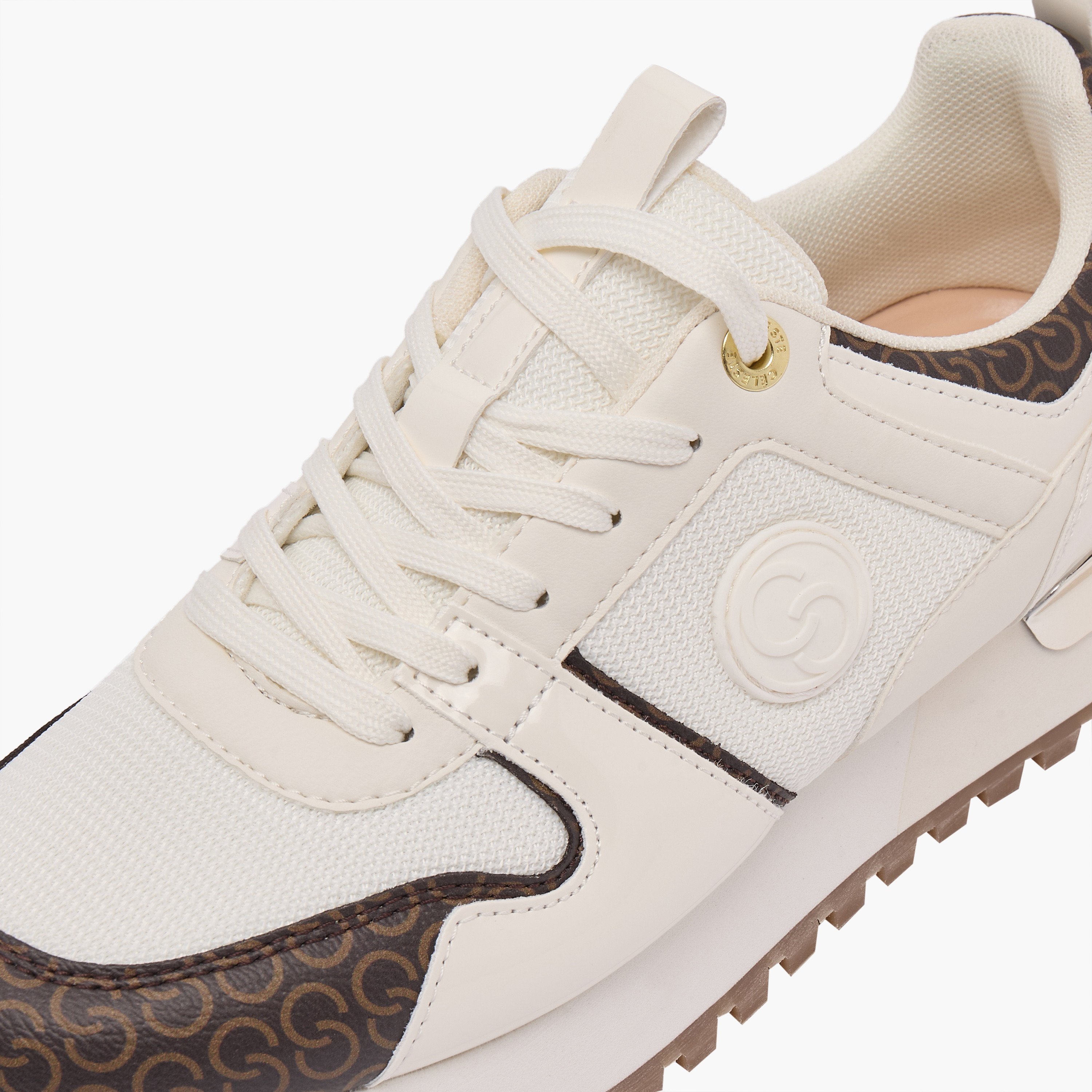 حذاء سنيكرز طول الكاحل بطبعات مونوجرام ورباط للنساء من سيلست-women-shoes-sneakers-image-4