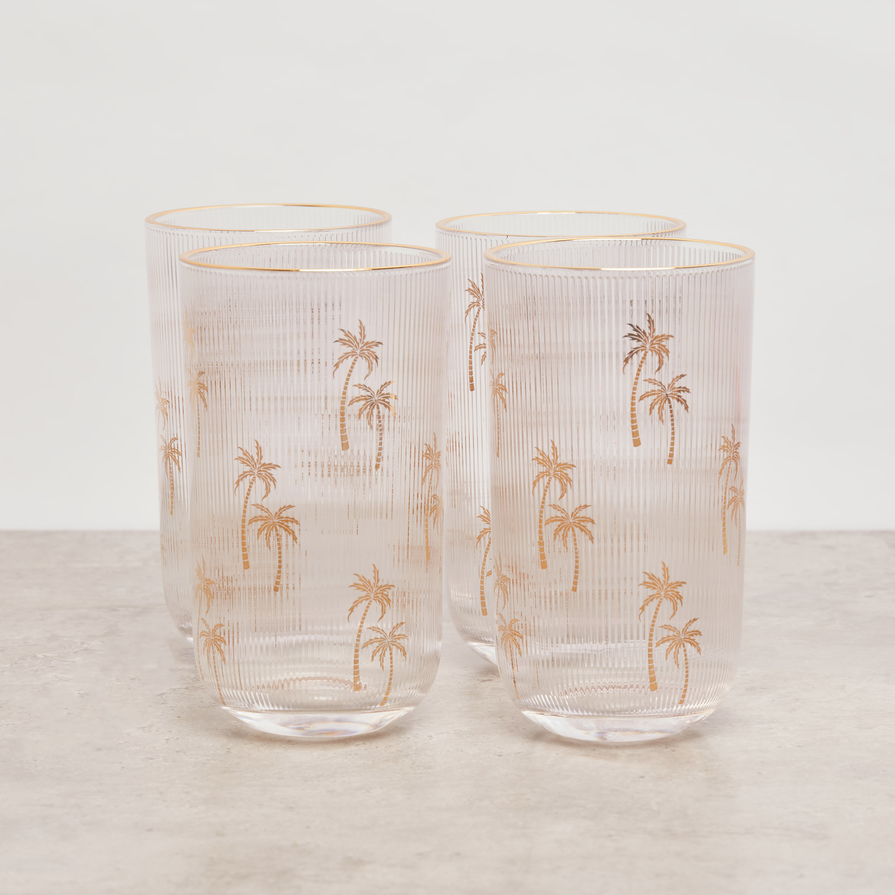 كاسات بطبعات نخيل - طقم من 4 قطع-household-dining-drinkserveware-bottles-image-1
