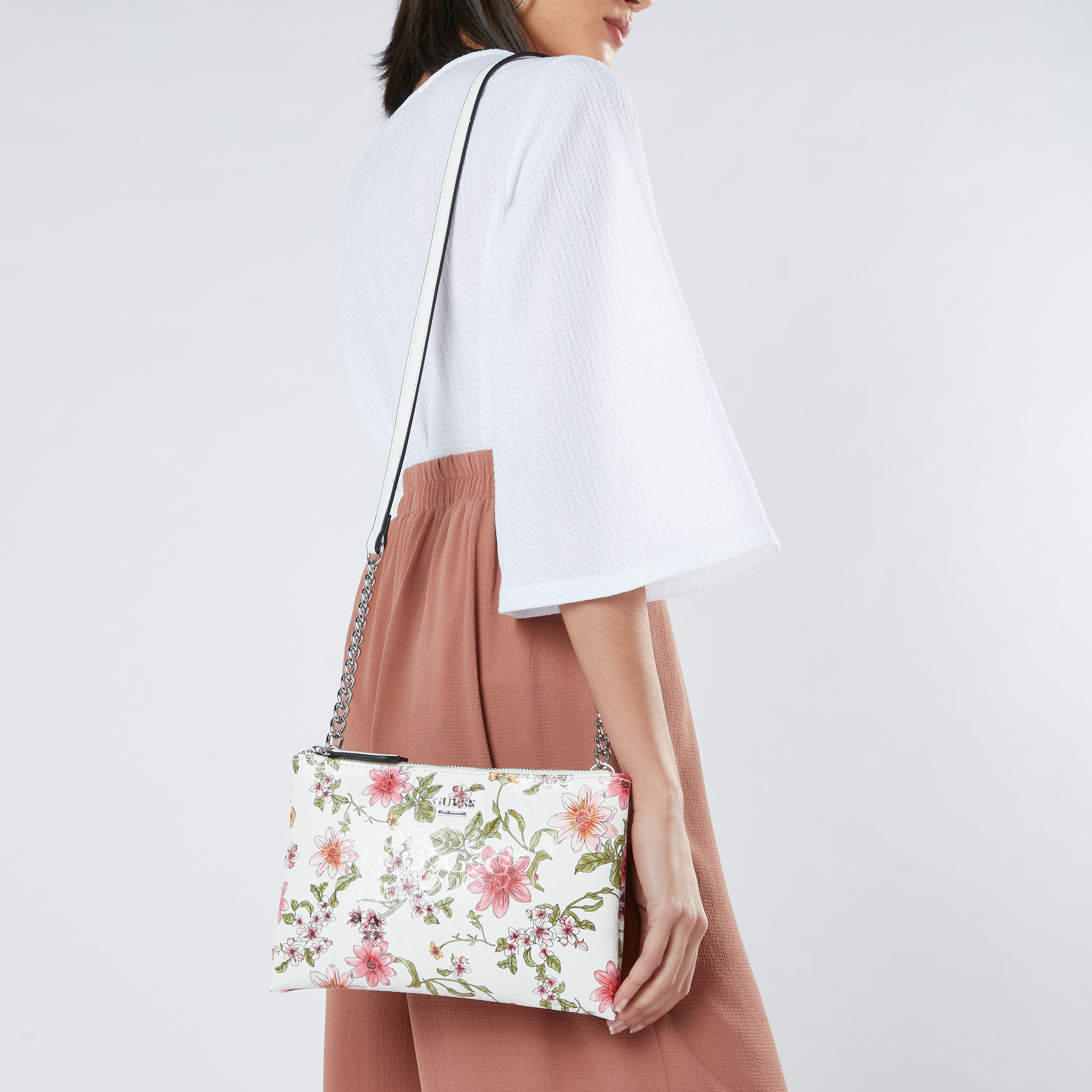 Guess floral sling bag on sale