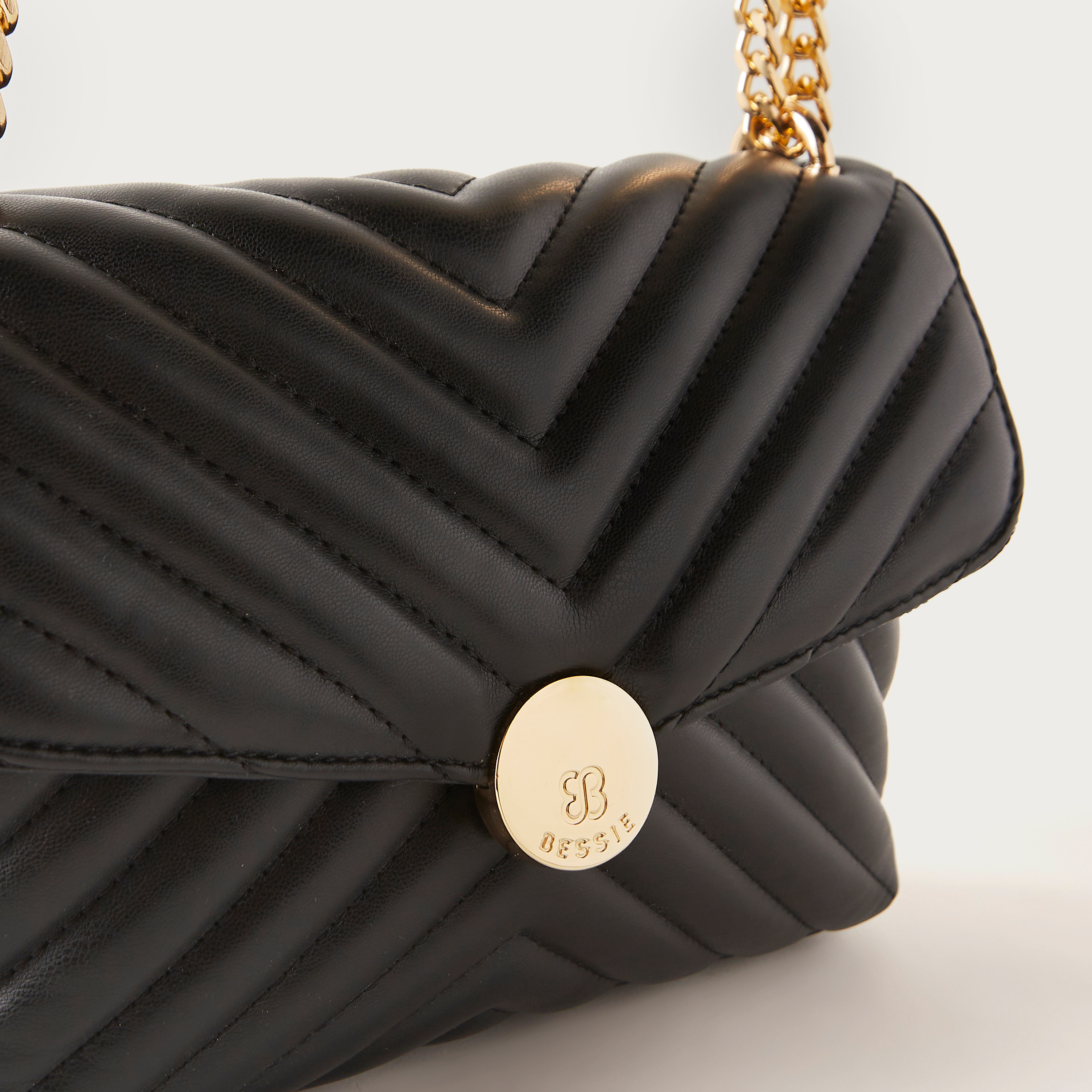 شنطة كروس بودي مبطنة بمقبض مزدوج مزين بسلسلة وطية إغلاق من بيسي لندن-women-bagsandwallets-handbags-image-2