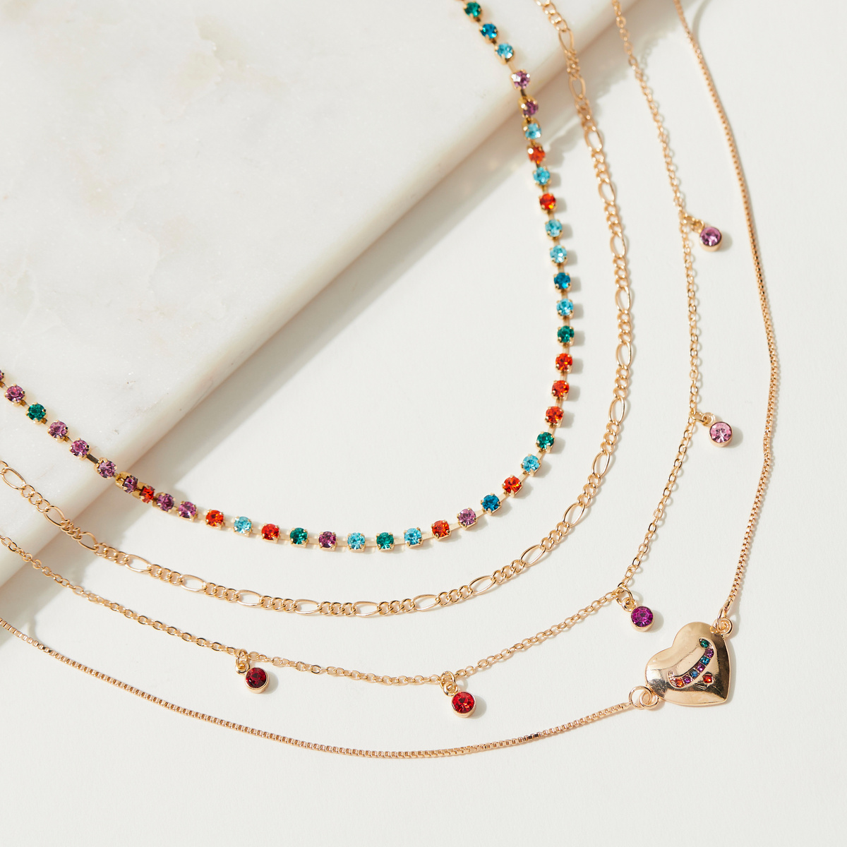4-Layered Necklace with Arabic Alphabet Debossed Pendant