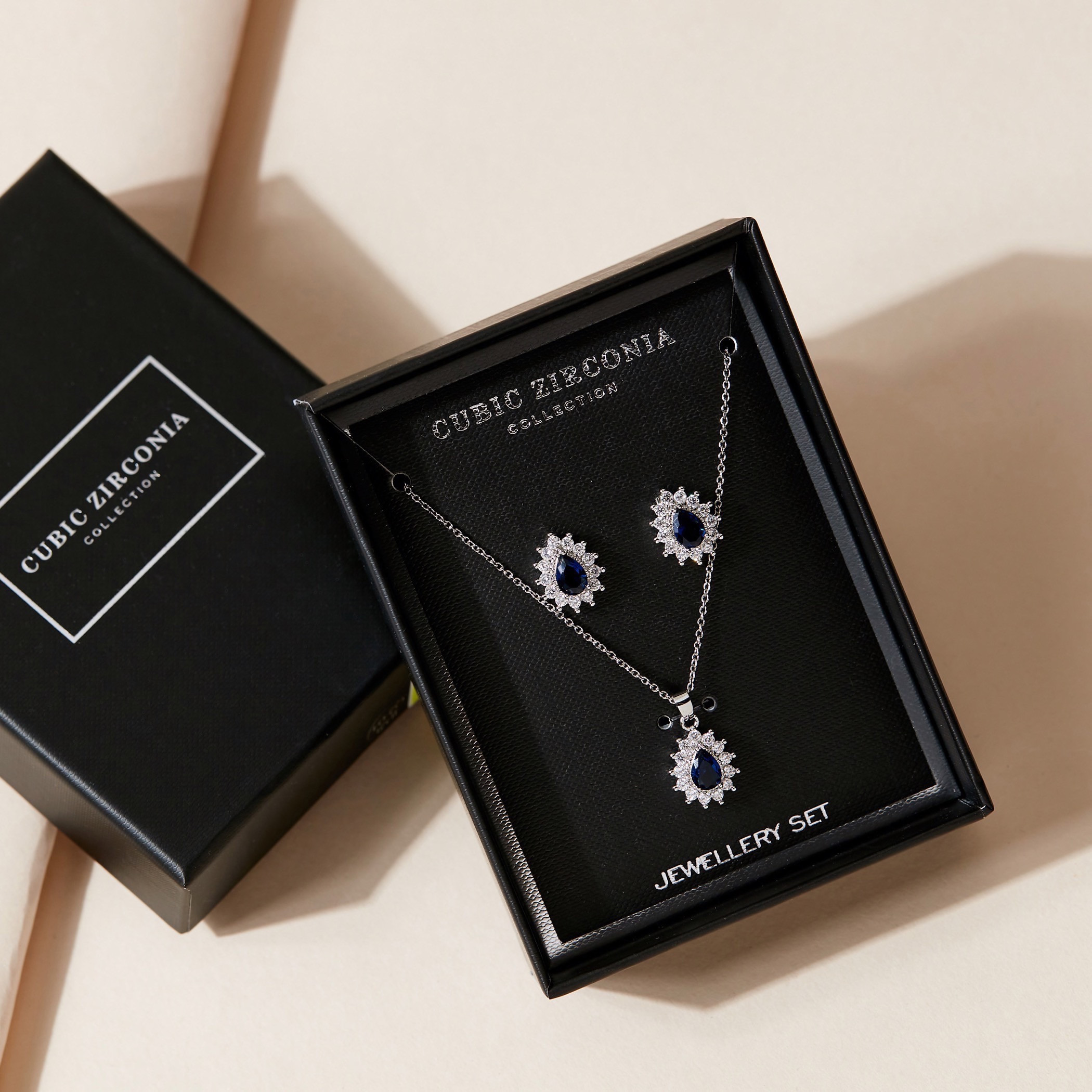 Cubic Zirconia Blue Stone Embellished Pendant Necklace and Stud Earrings-women-watchesandjewellery-jewellery-jewellerysets-image-1