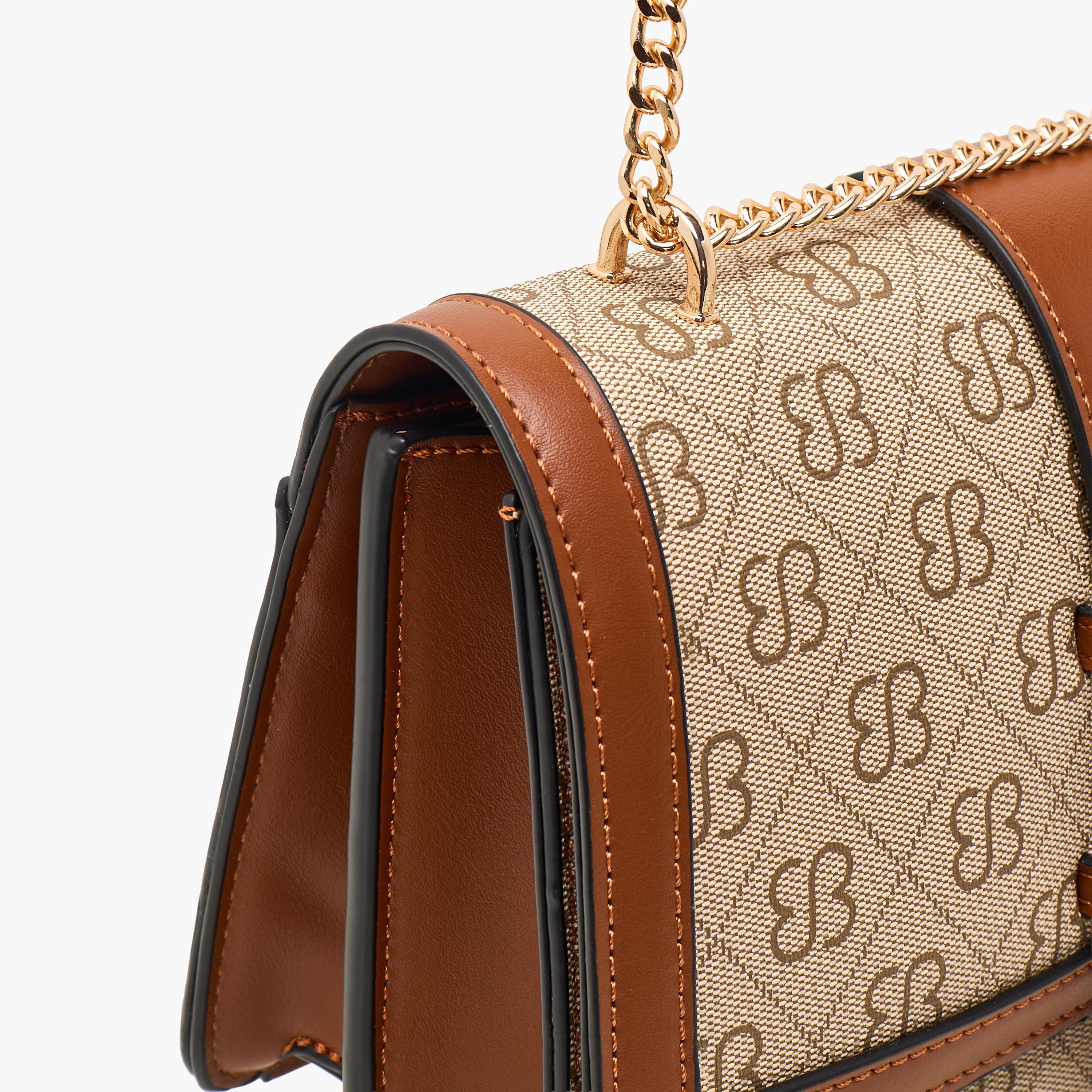 شنطة كروس بودي بطبعات وحزام سلسلة وطية إغلاق من بيسي لندن-women-bagsandwallets-handbags-image-6