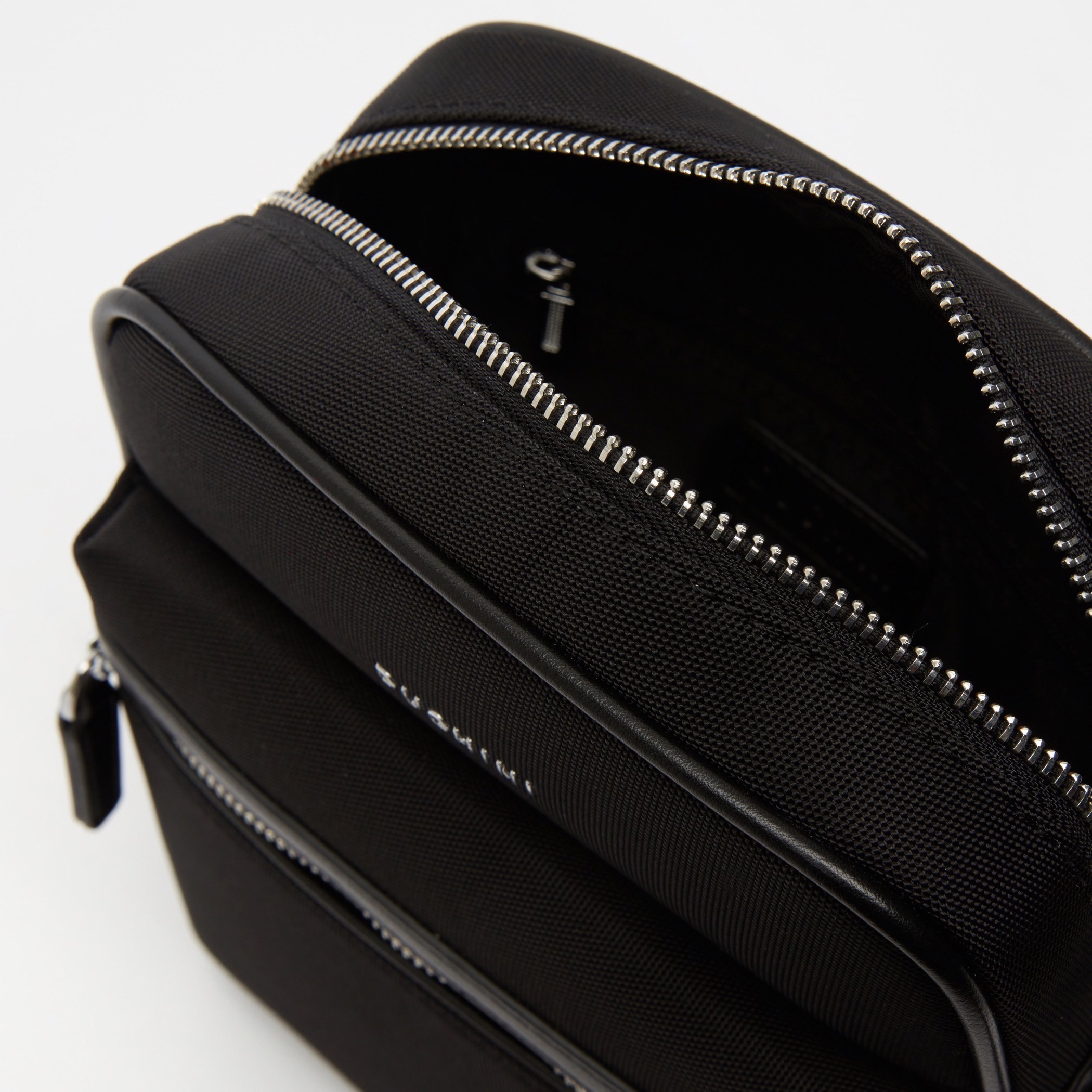 Duchini Solid Crossbody Bag with Adjustable Strap and Zip Closure-travel-accessories-image-6