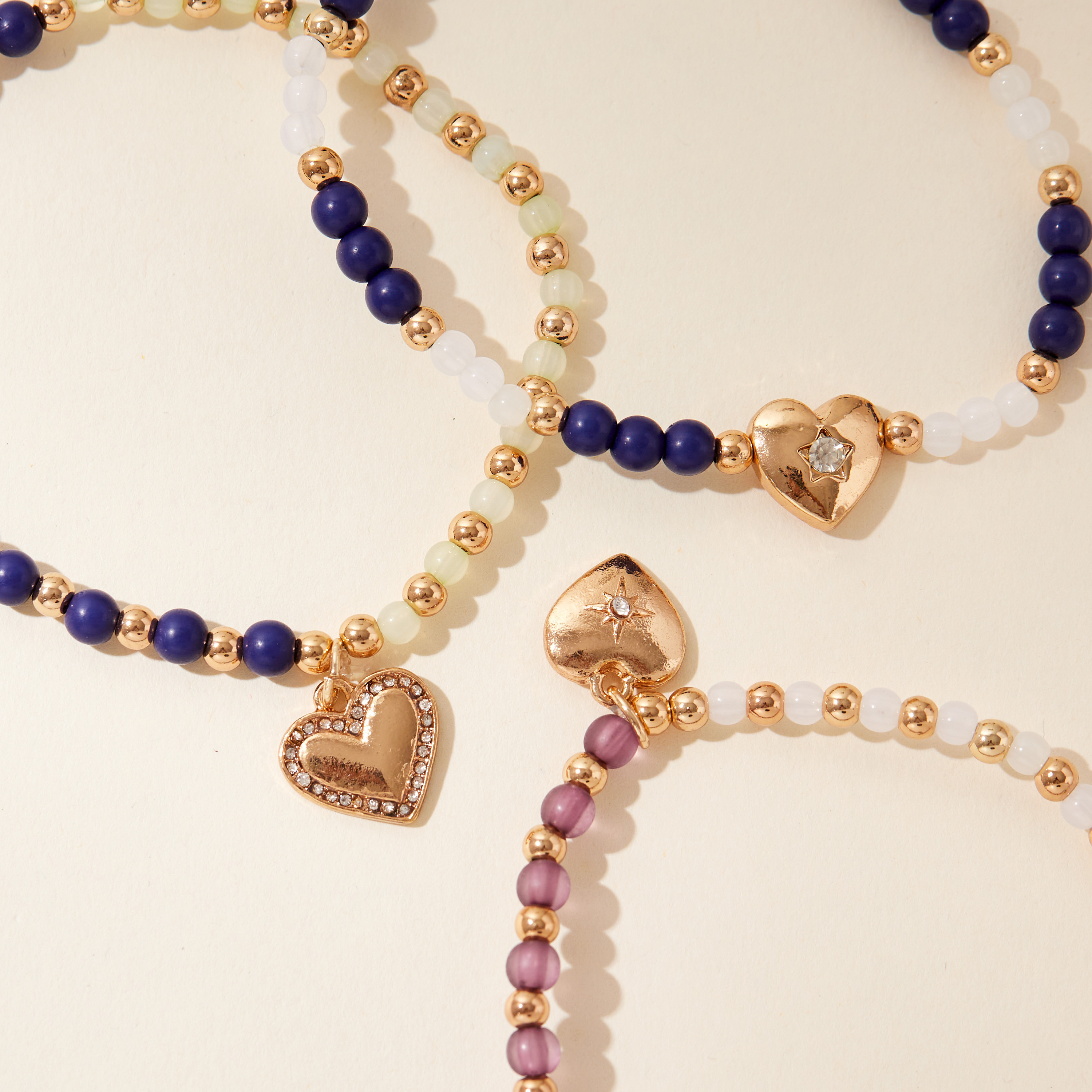 أسورة مطاطية مزينة بالخرز وبدلاية قلب - طقم من 3-women-watchesandjewellery-jewellery-banglesandbracelets-image-3