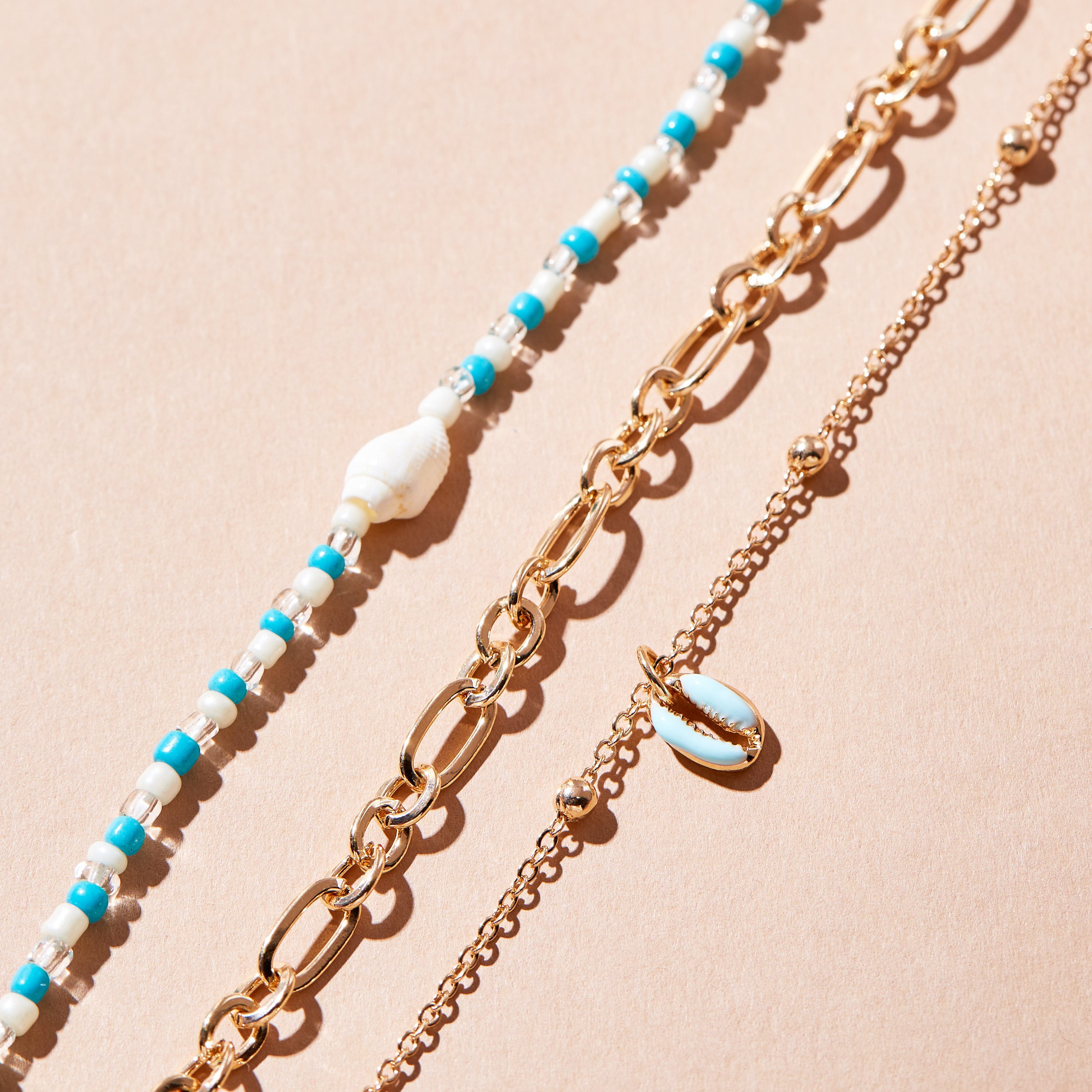 خلاخيل مزينة بالخرز بمشبك إغلاق - طقم من 3 قطع-women-watchesandjewellery-jewellery-anklets-image-1