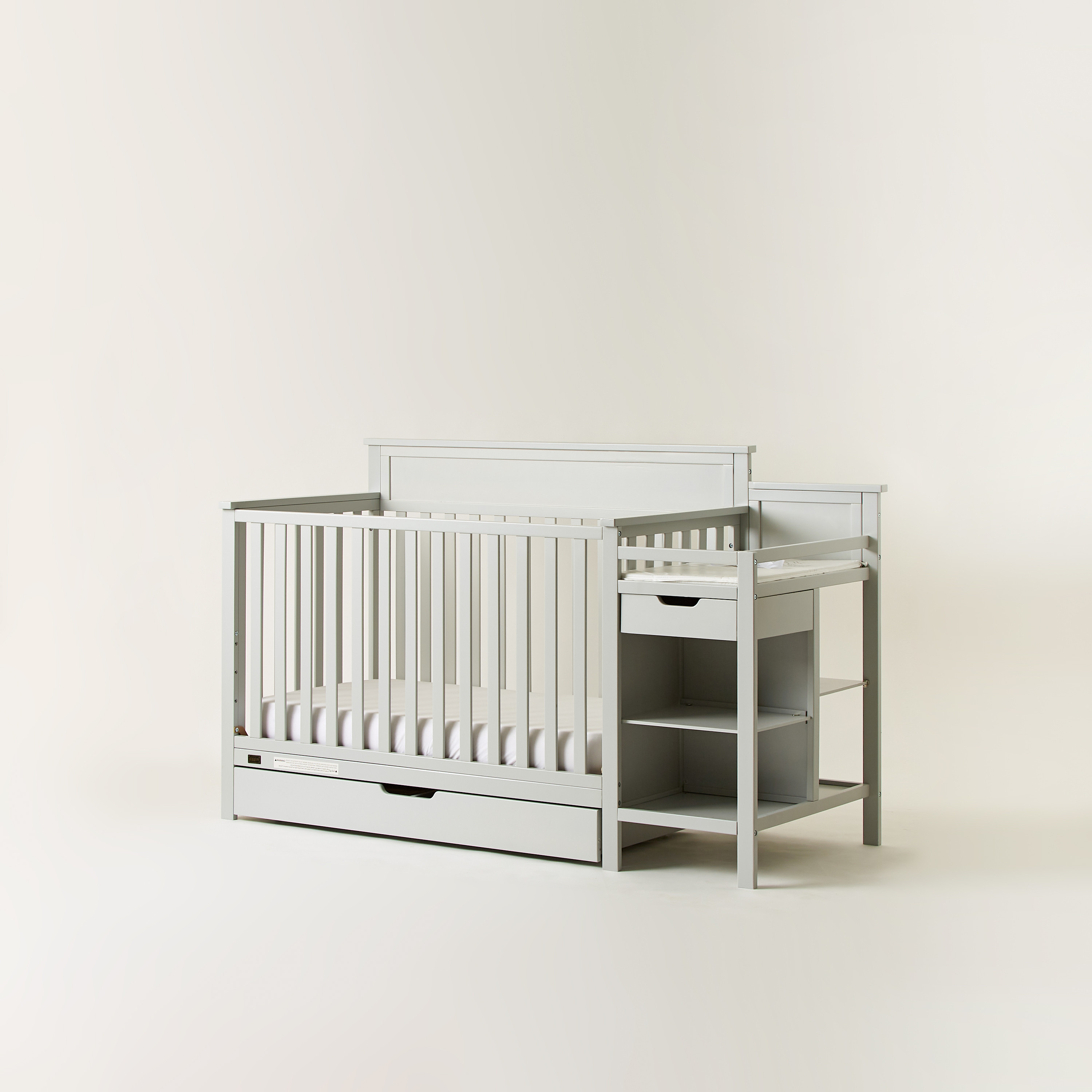 Grey 4 in 1 outlet crib with changing table