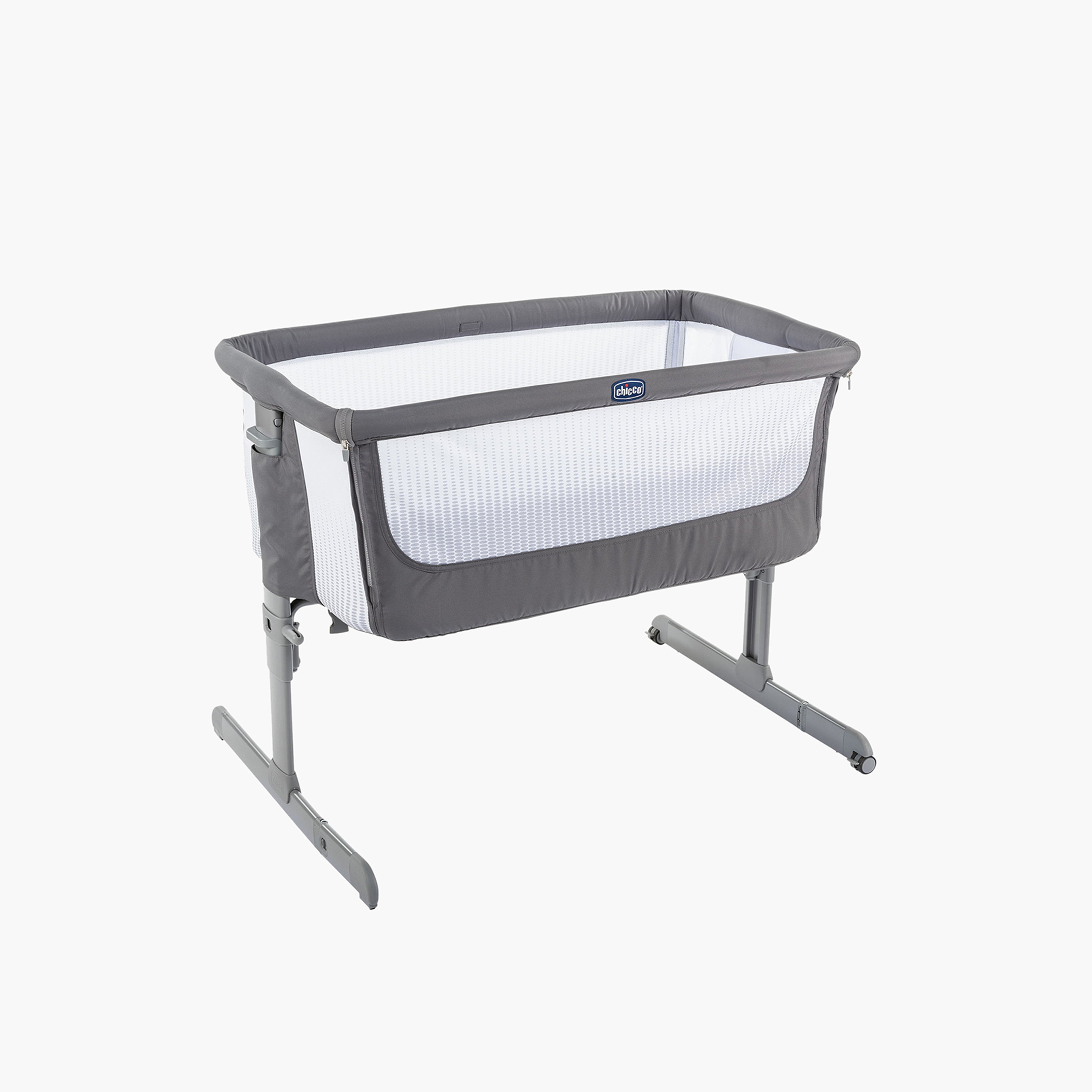 Bassinet with outlet fold down side