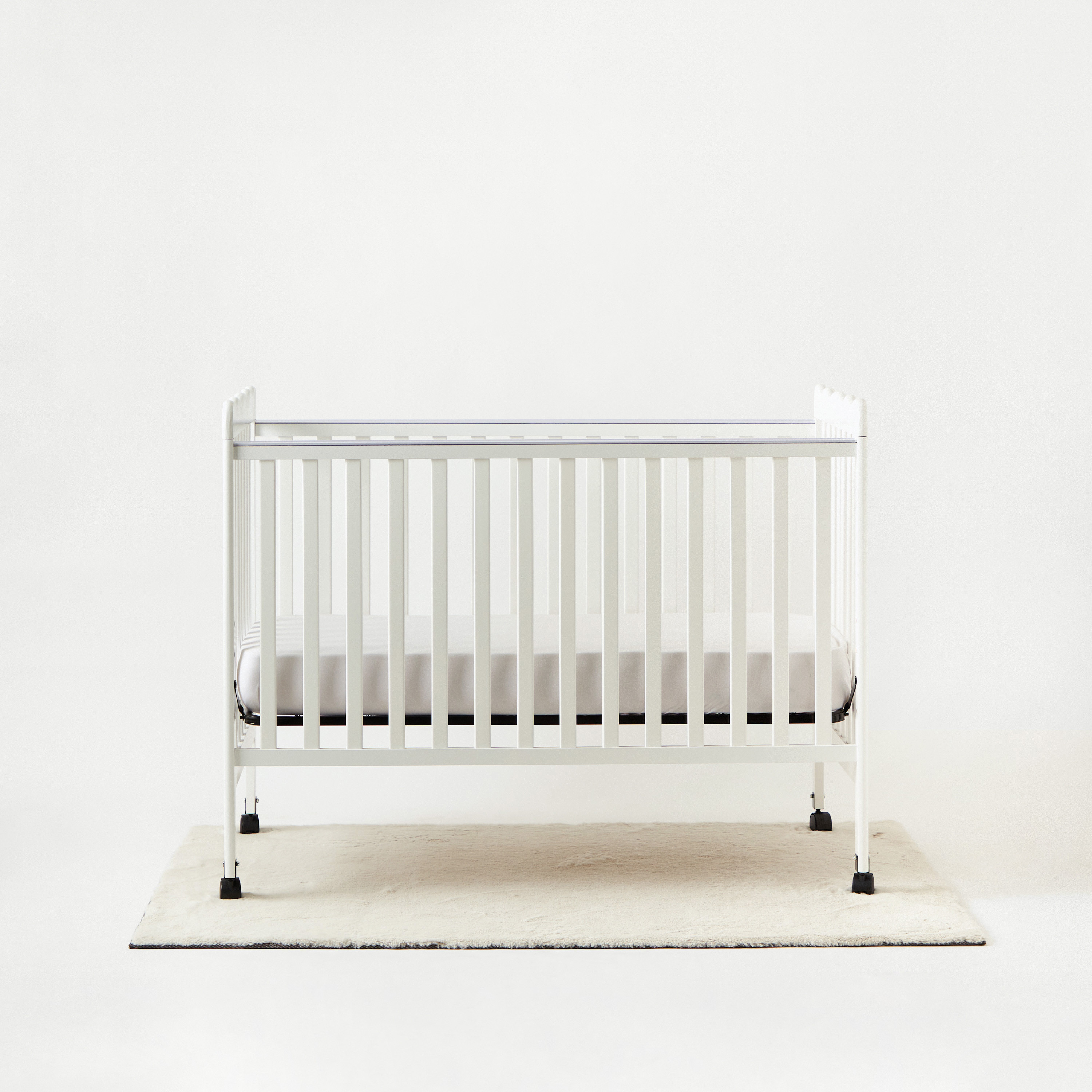 Baby crib on wheels on sale