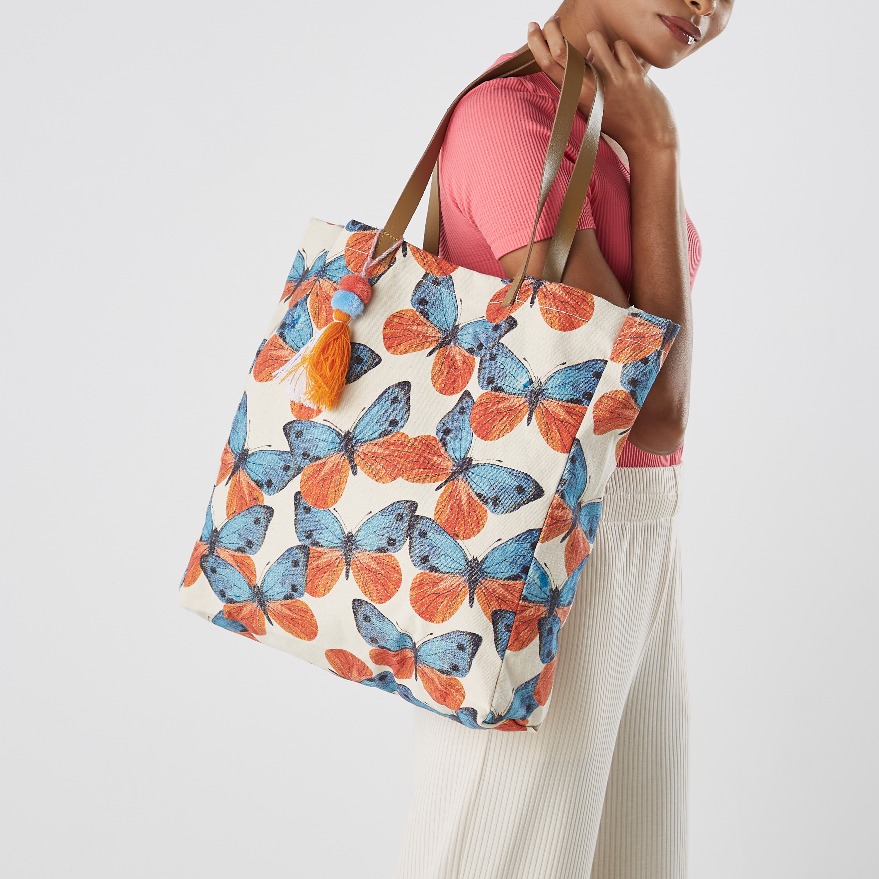 Handbags with butterfly outlet print