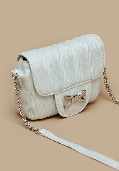 Little Missy Textured Crossbody Bag with Bow Accent and Button Closure