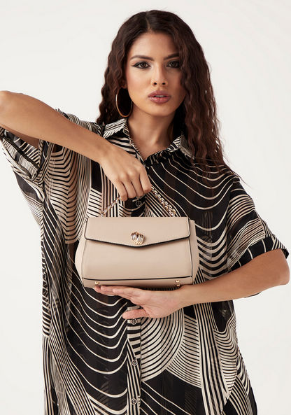 Celeste Solid Crossbody Bag with Button Closure-Women%27s Handbags-image-0