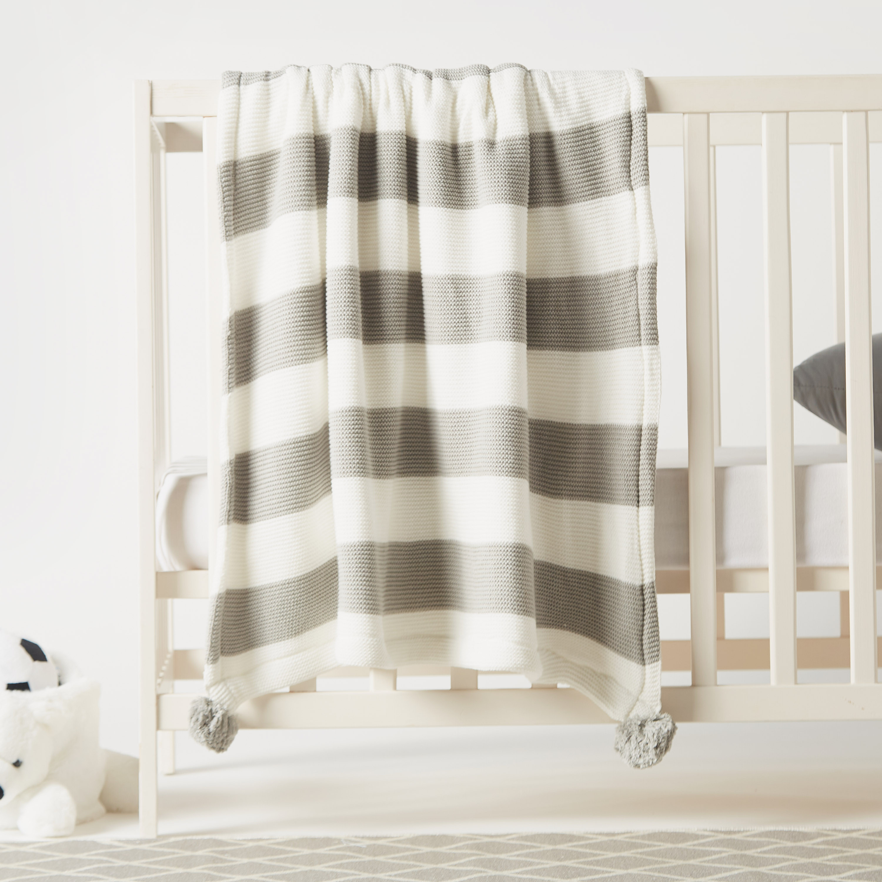 Juniors Striped Knitted Raschel Blanket with Pom Pom Detail - 100x80 cms-baby-nursery-blanketsandswaddles-blanketsandquilts-image-1