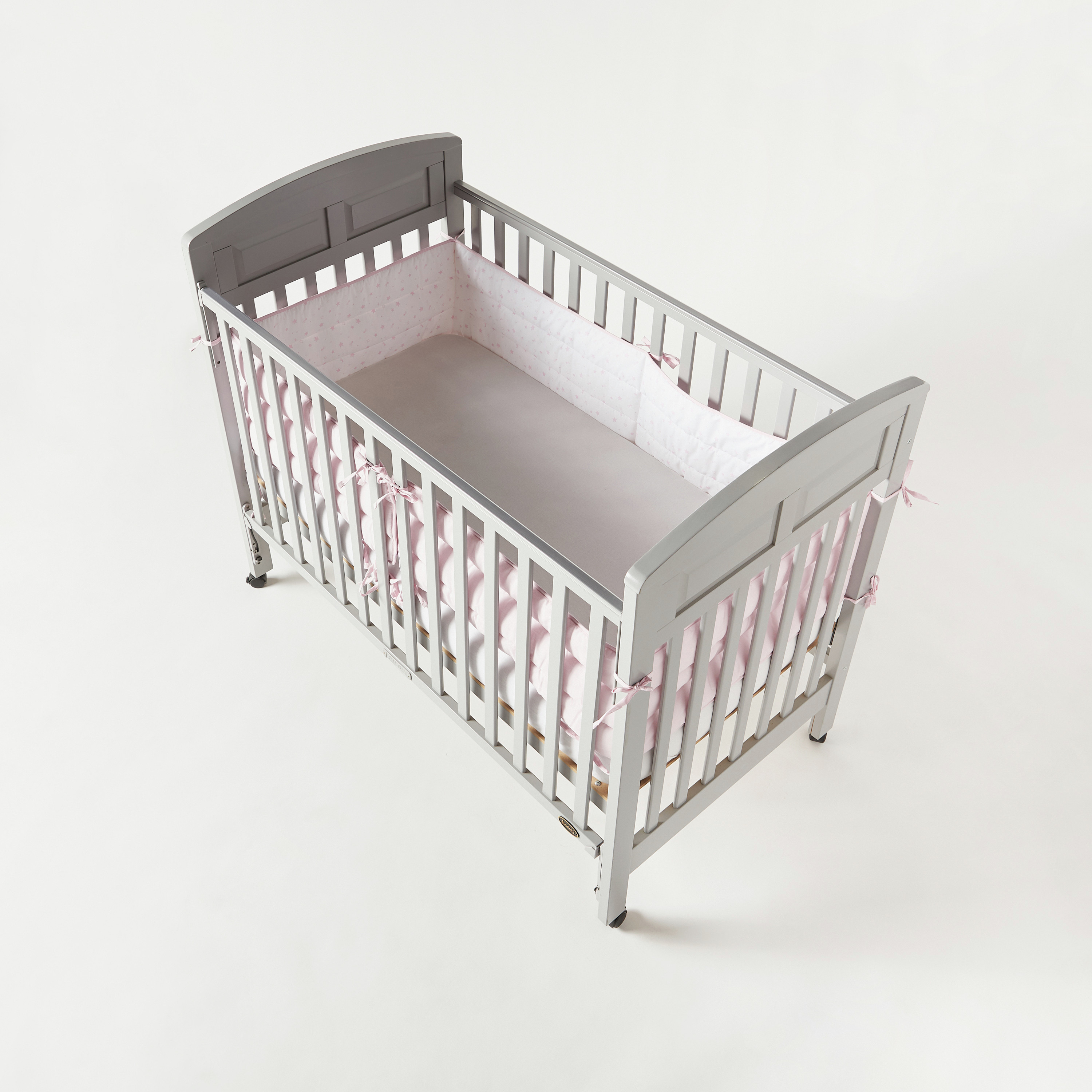 Baby best sale cot barrier