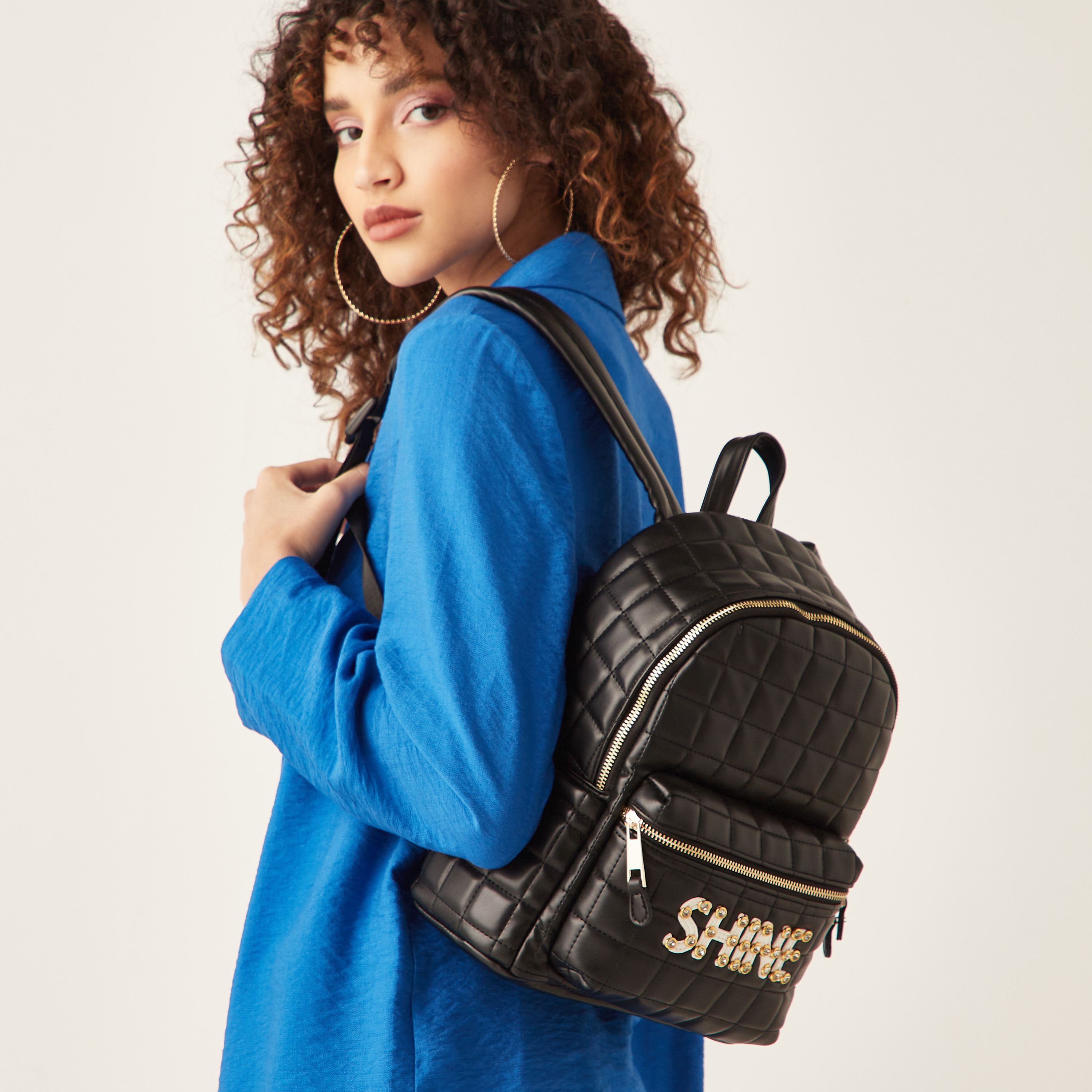 شنطة ظهر مبطنة بتفاصيل مزخرفة وأشرطة قابلة للتعديل من ميسي-women-bagsandwallets-backpacks-image-1