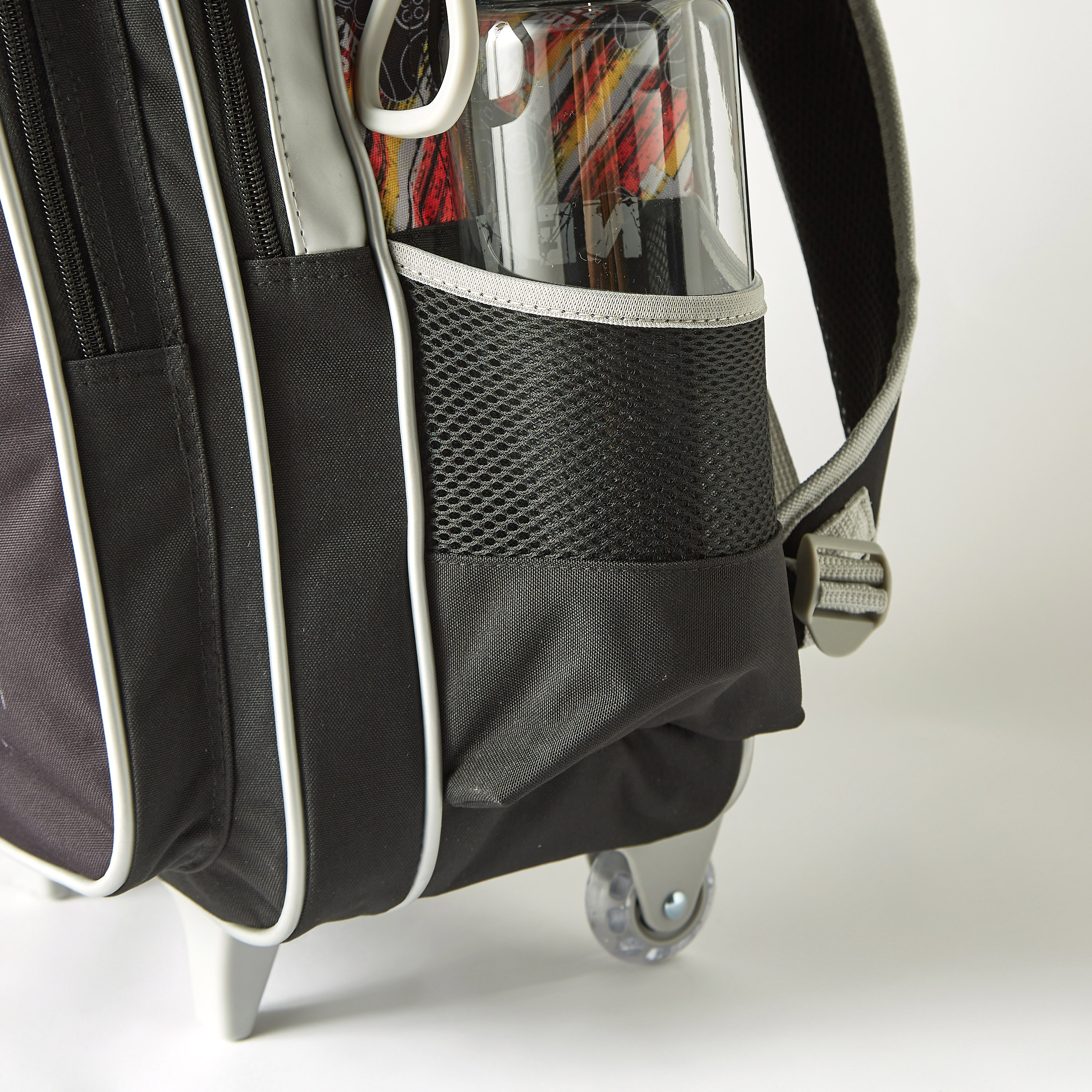 شنطة ظهر ترولي 18 بوصة بعجلات وطبعات من سامي ستوديو - 33x14x45 سم - ضمان سنة واحدة-school-bagsandbackpacks-trolleybags-image-6