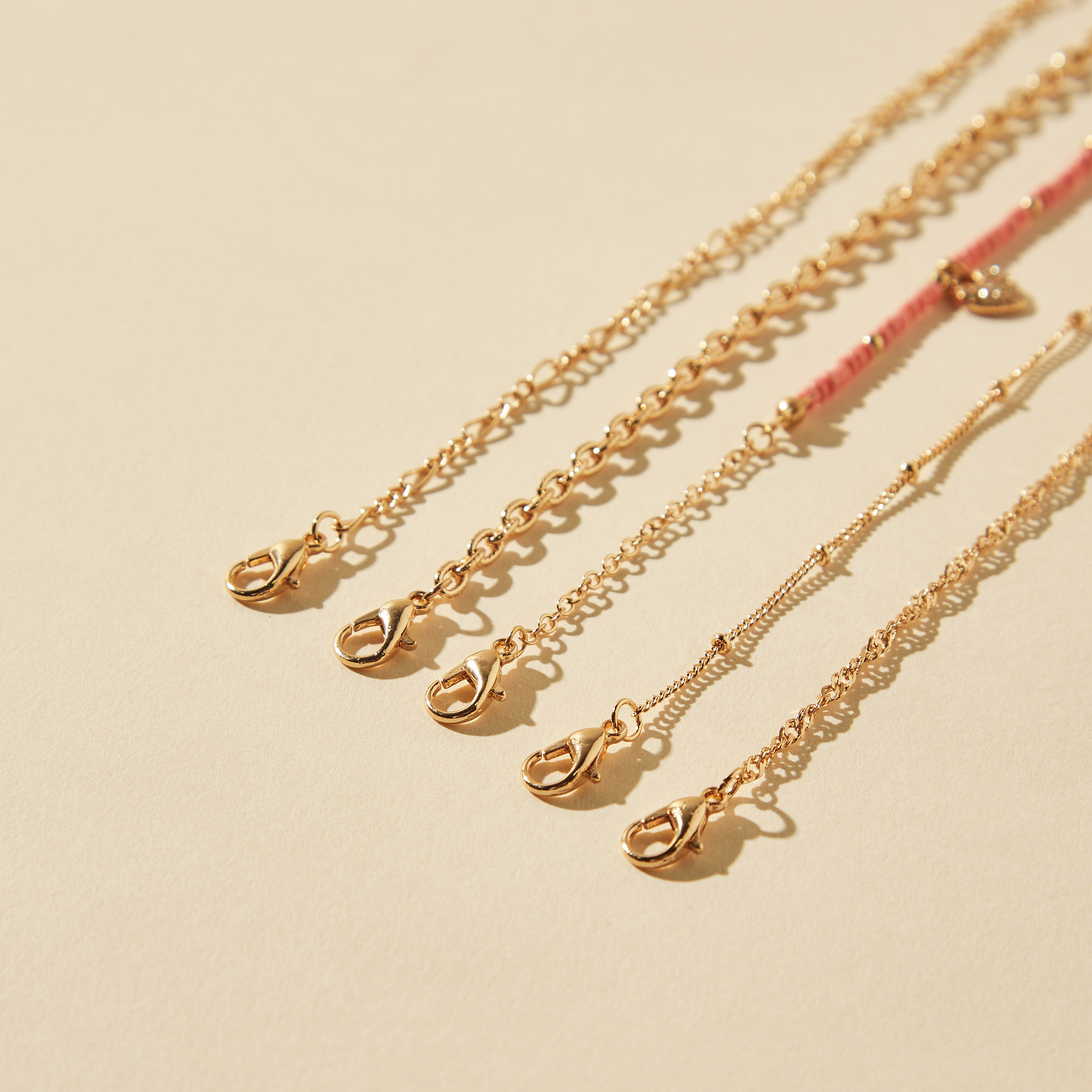 خلاخيل متنوعة بمشبك إغلاق - طقم 5 قطع-women-watchesandjewellery-jewellery-anklets-image-1
