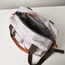 شنطة حفاضات بطبعات ويني ذا بو من ديزني-baby-diapering-diaperbags-image-1