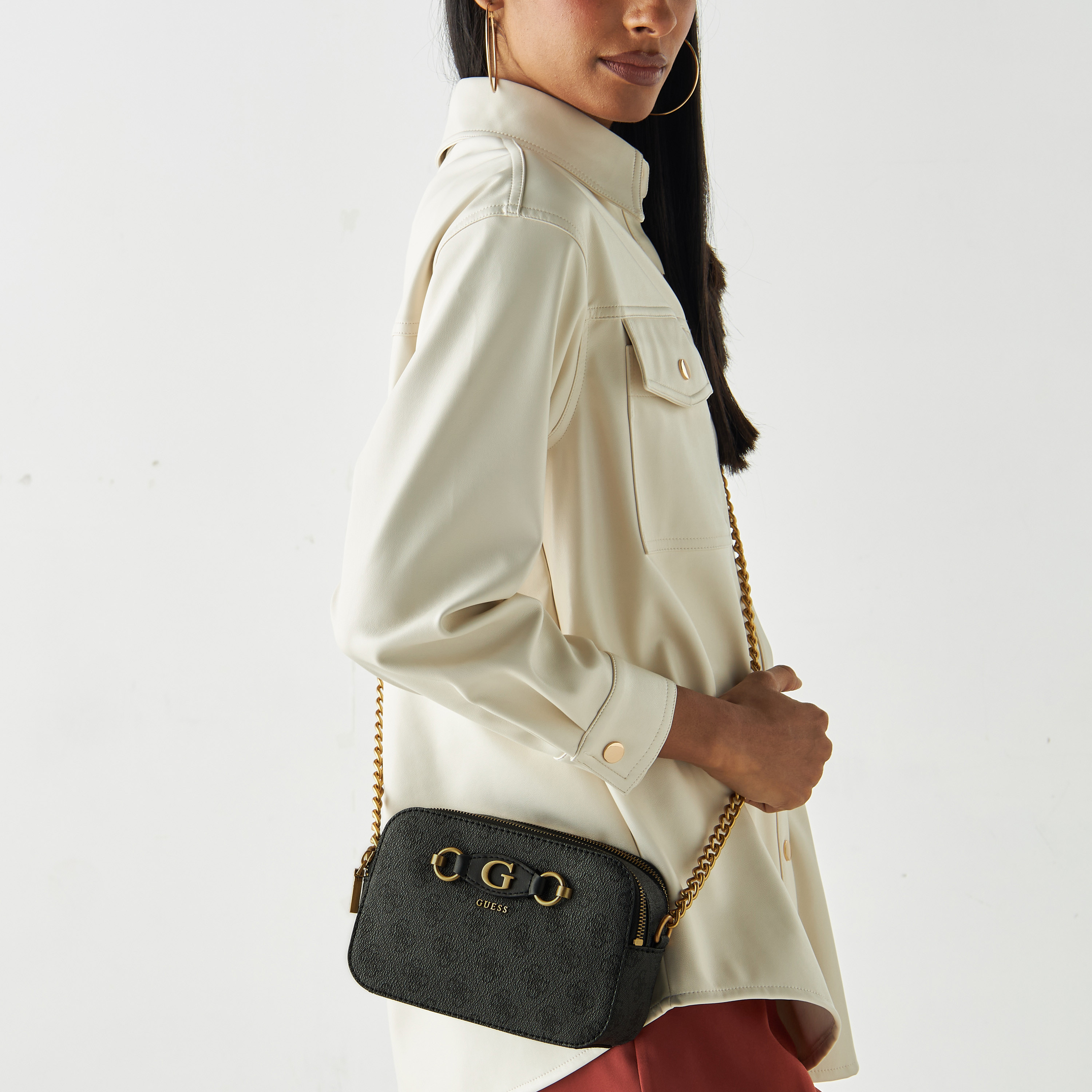 Metallic signature east outlet west crossbody