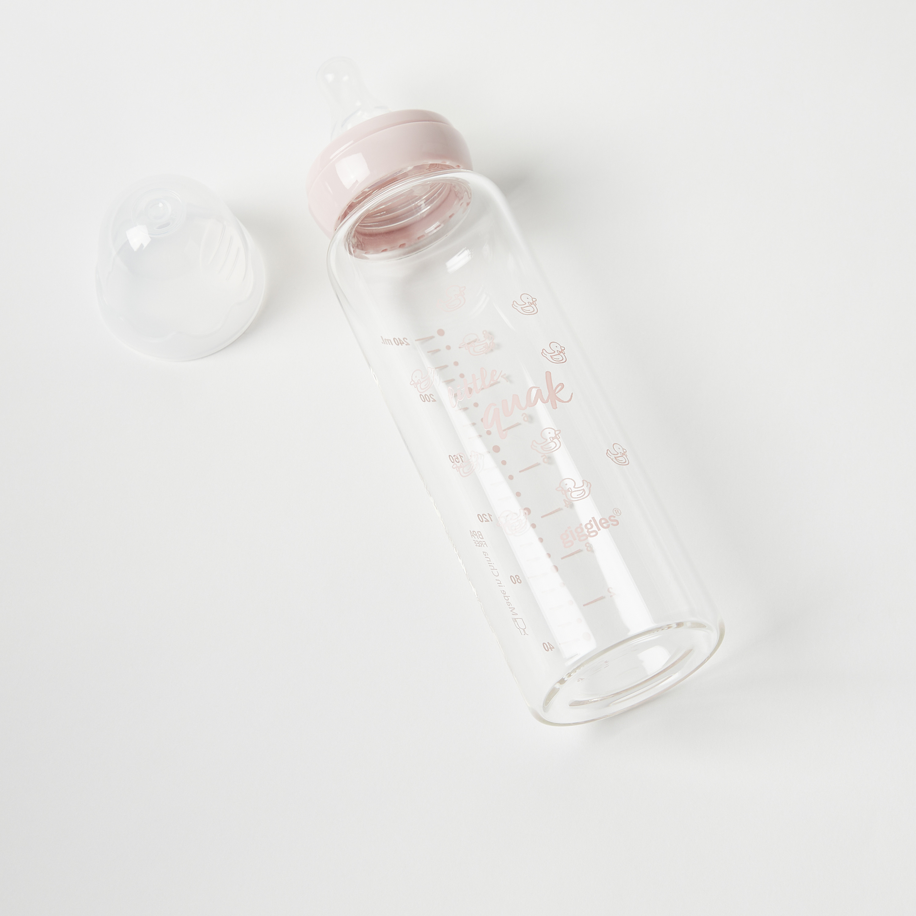 رضّاعة زجاج بطبعات داكي لوف من جيجلز - 240 مل-baby-feeding-feedingbottles-bottlesandteats-image-3