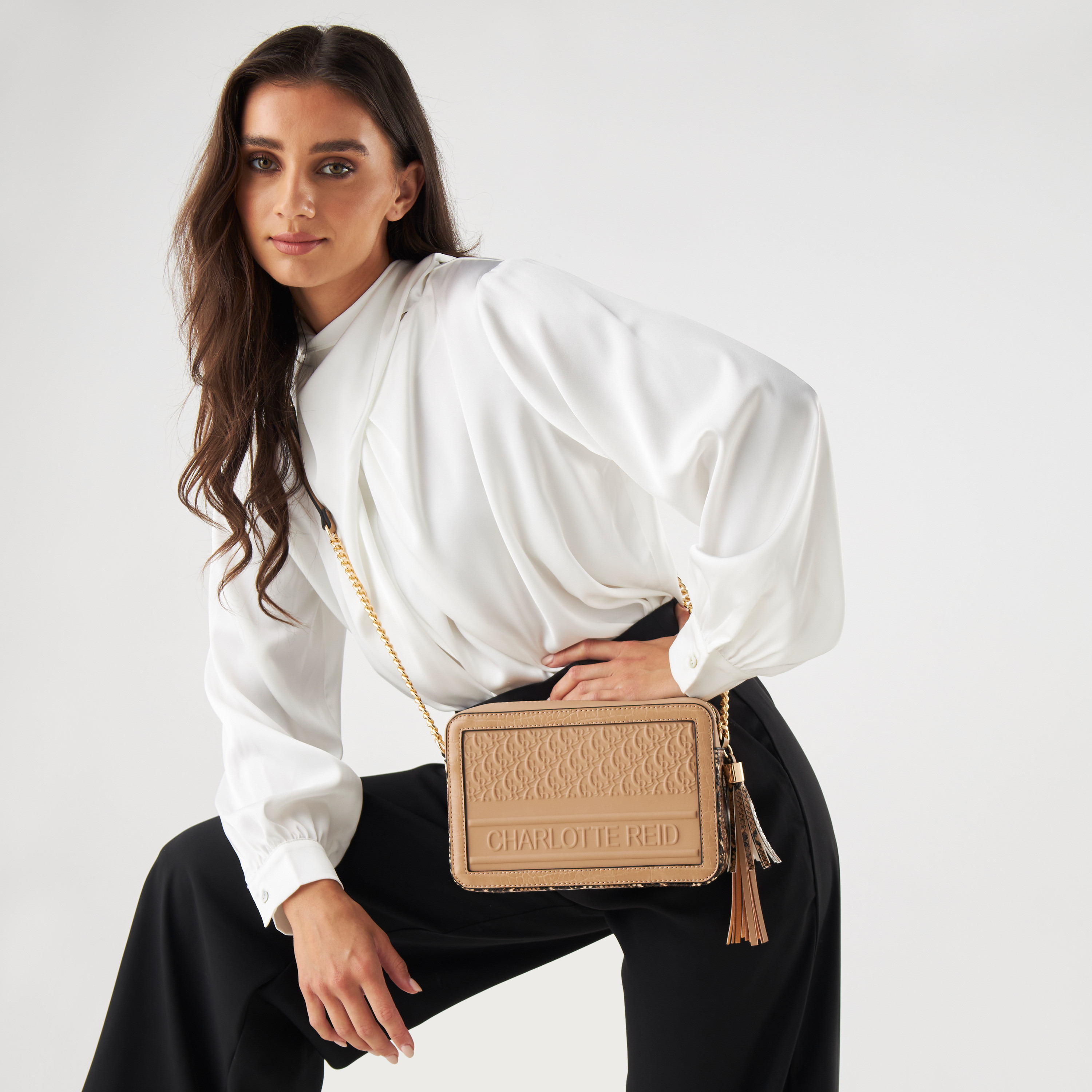 Charlotte Reid Textured Crossbody Bag with Adjustable Strap and Zip Closure-women-bagsandwallets-handbags-image-2