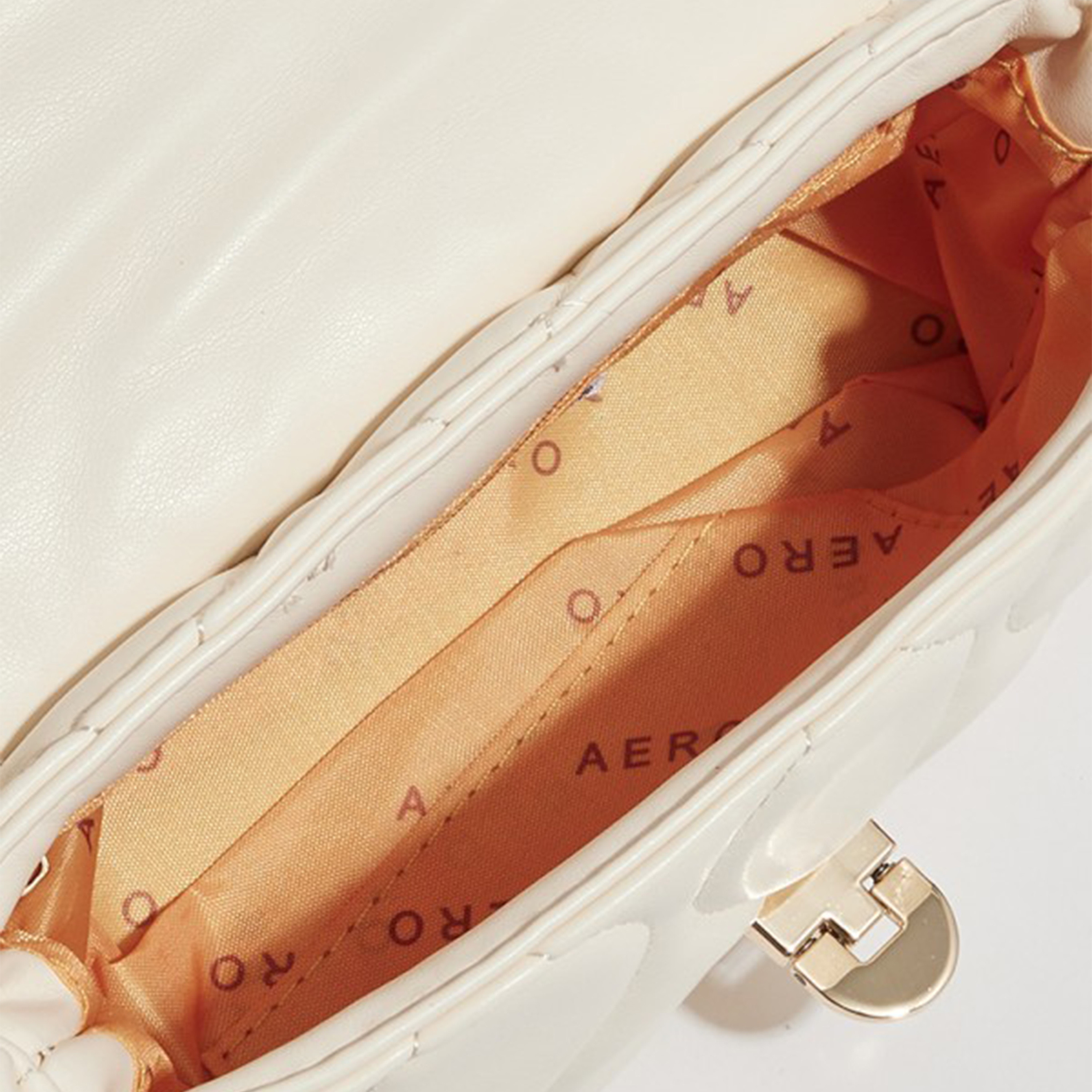 أيروبوستال شنطة كروس مبطنة لون أسود بحزام سلسلة وشعار معدني بالخلف-women-bagsandwallets-handbags-image-8