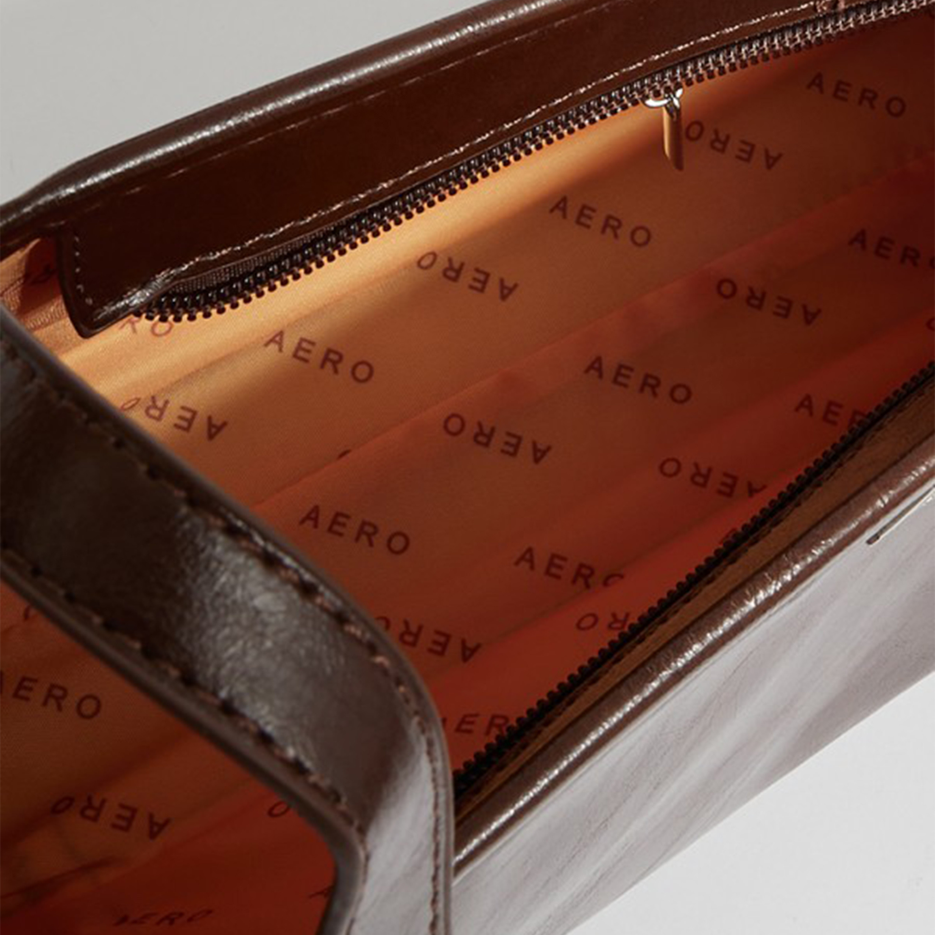 أيروبوستال شنطة كتف لون بني بشعار معدني-women-bagsandwallets-handbags-image-4