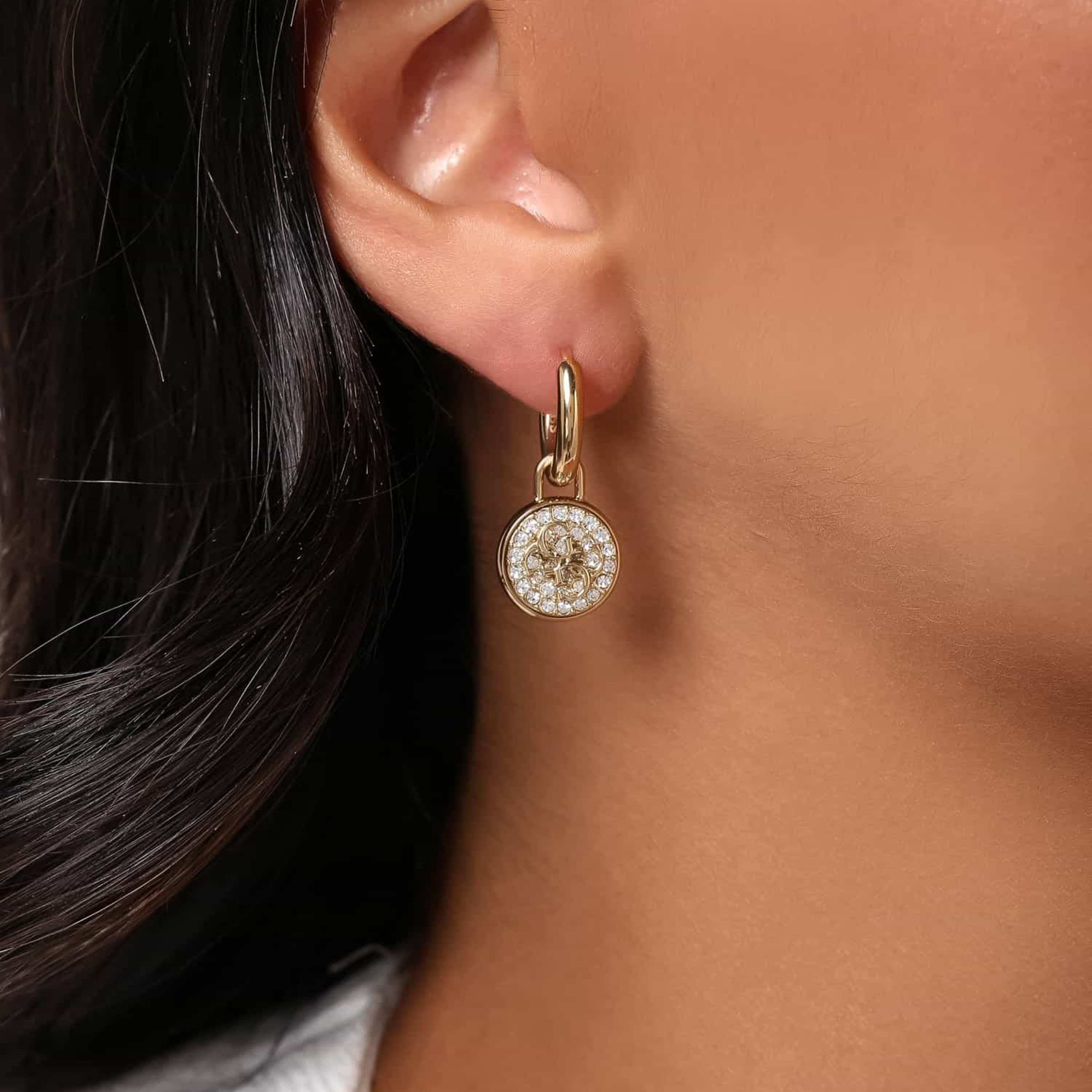 Guess Gold Dreaming Huggies Hoop Earrings | JUBE03131JW-women-watchesandjewellery-jewellery-earrings-image-3
