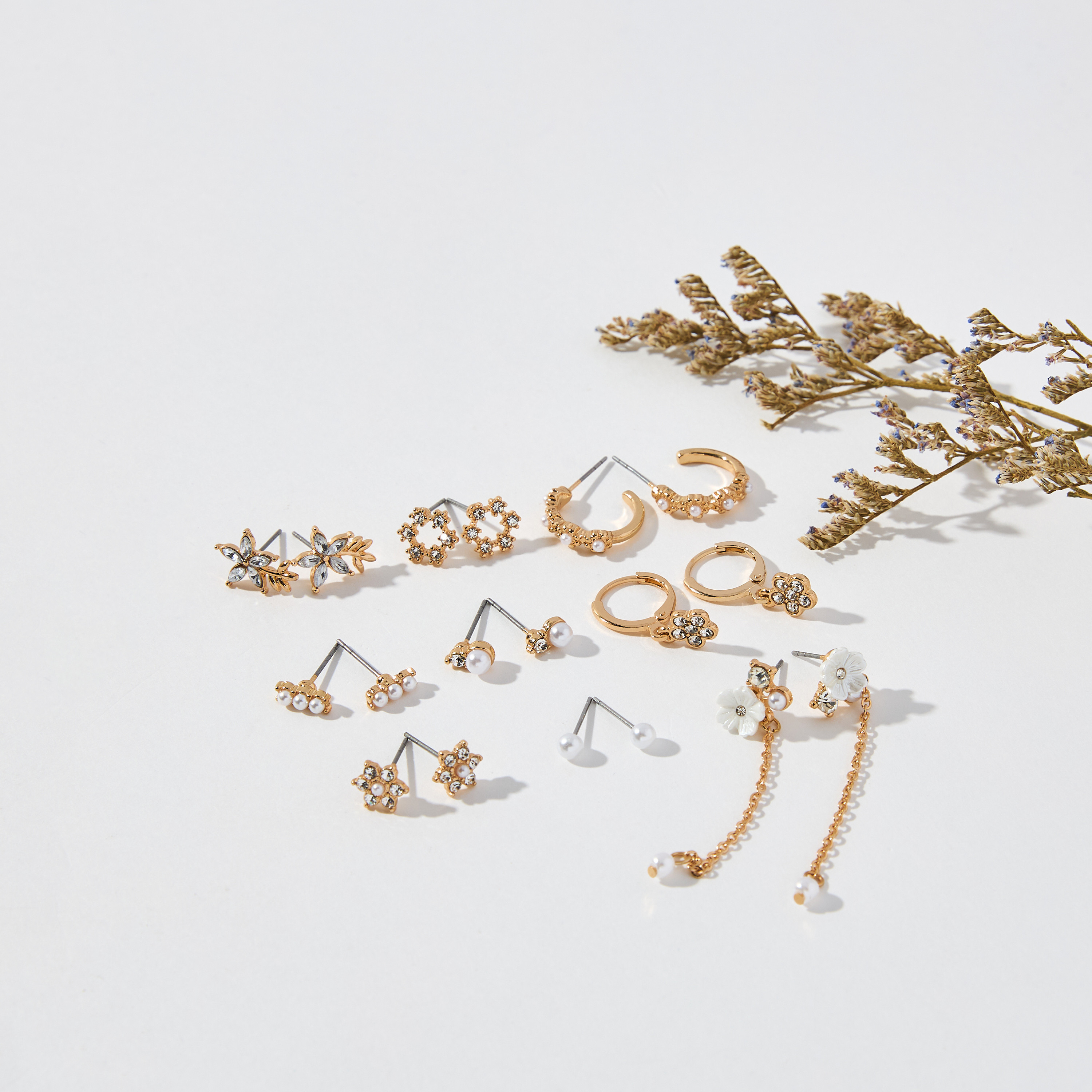 حلقان متنوعة بمكبس إغلاق خلفي - طقم من 9-women-watchesandjewellery-jewellery-earrings-image-1