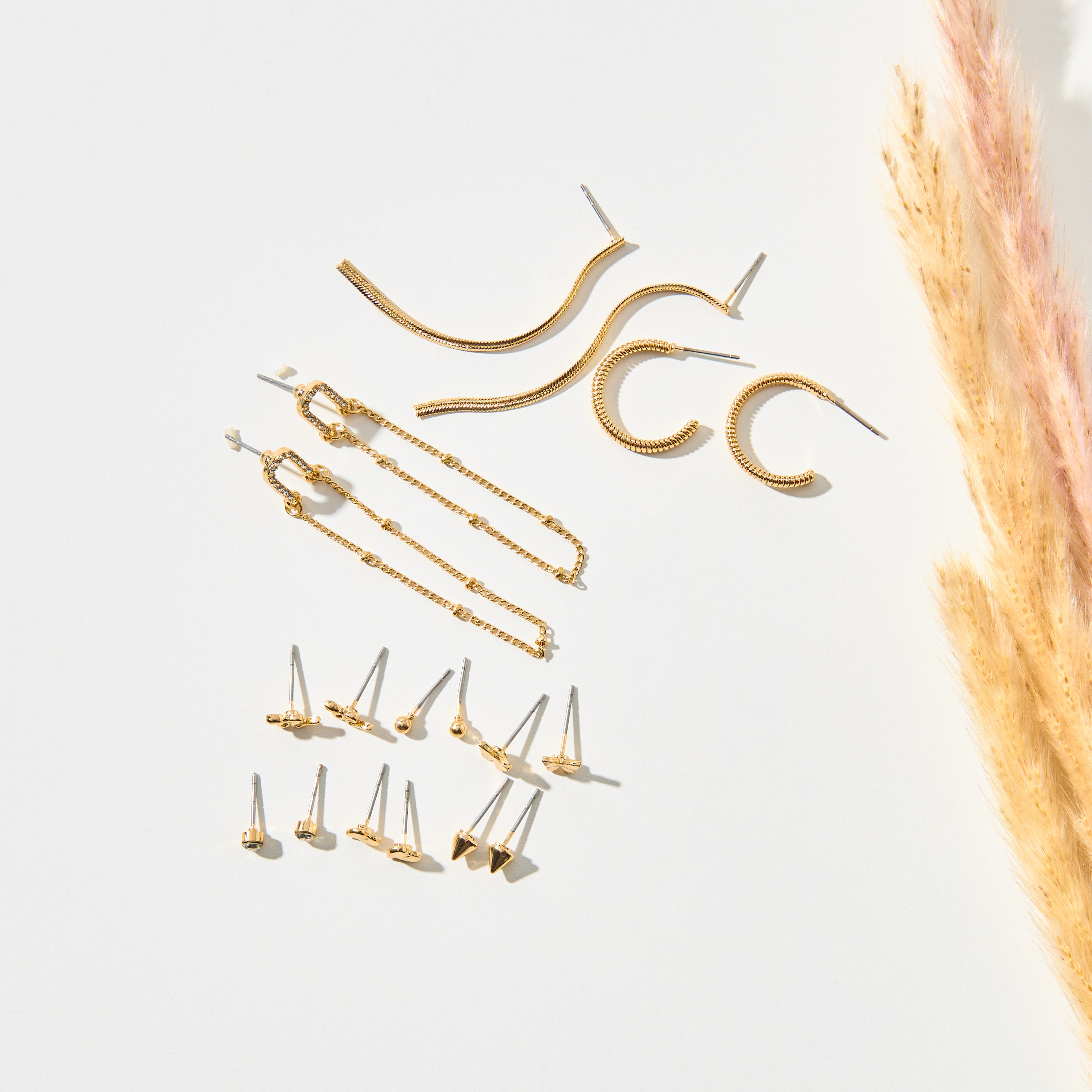حلقان متنوعة بمكبس إغلاق خلفي - طقم من 9-women-watchesandjewellery-jewellery-earrings-image-1