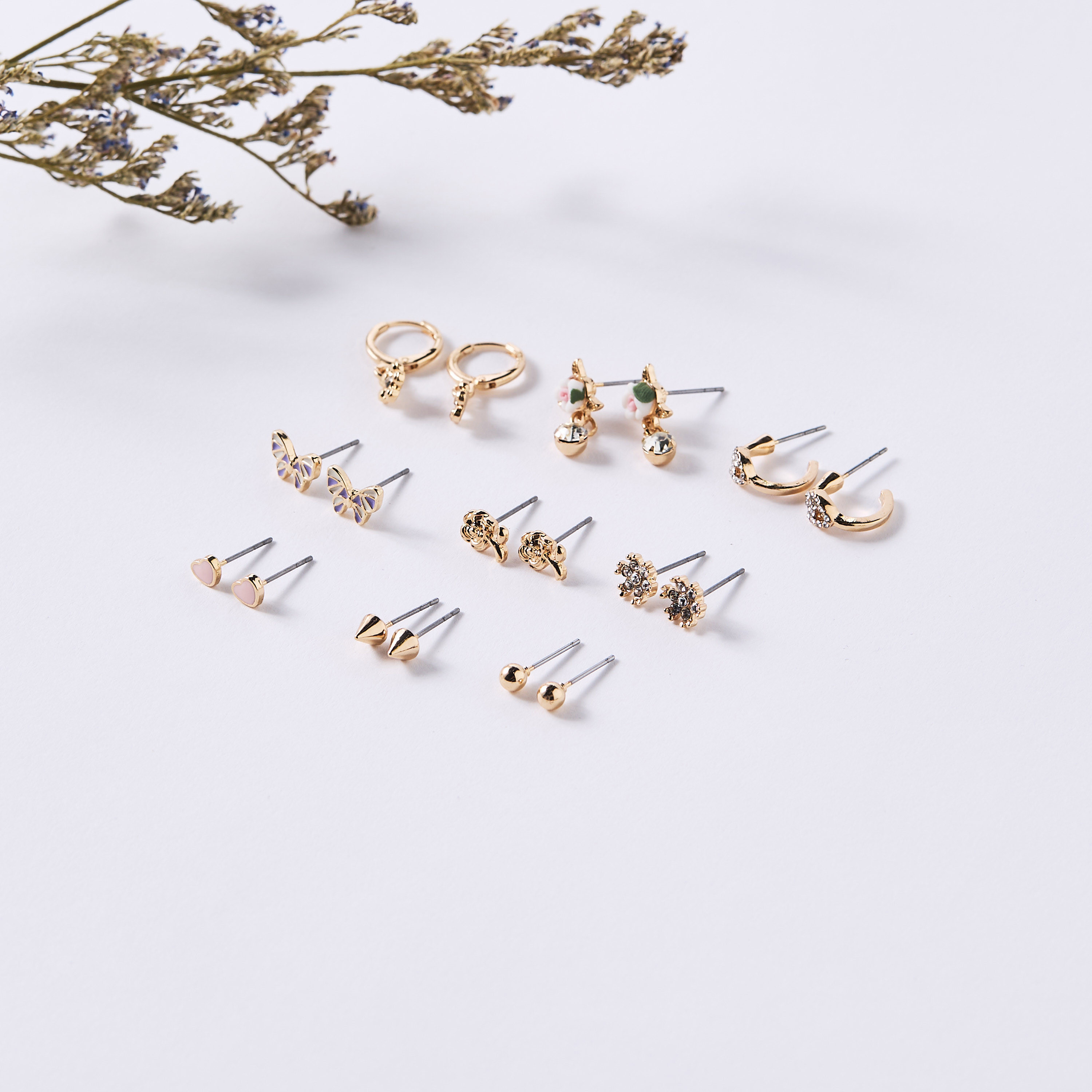 حلقان متنوعة بمكبس إغلاق خلفي - طقم من 9-women-watchesandjewellery-jewellery-earrings-image-1